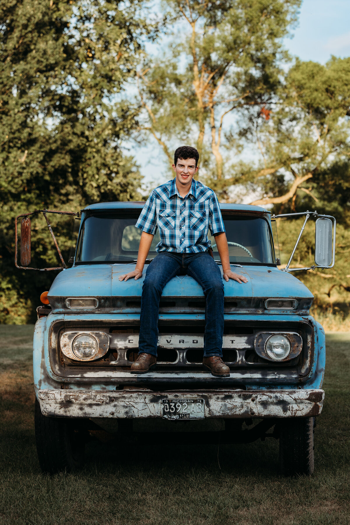 senior-boy-sitting-on-chevy-truck