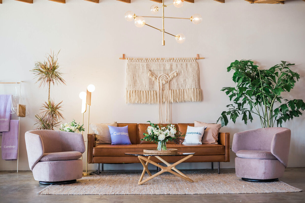 Pretty room with furniture, plants and chairs