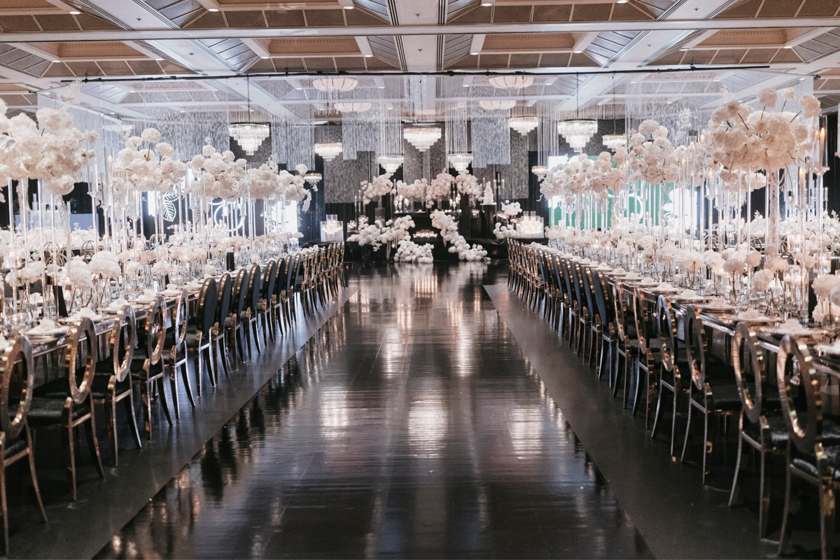 kavita-mohan-black-white-reception-aisle-vinyl-candelabras-centerpiece-chandelier