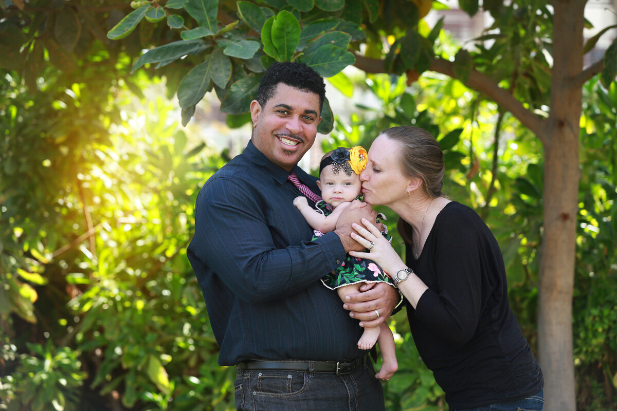 Family portrait in green trees