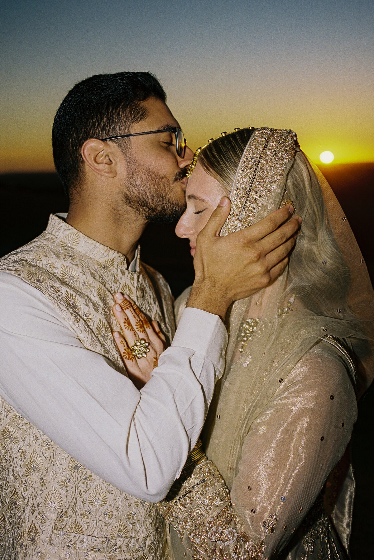 Couple in Pakistani attire during sunset at Marnong Estate wedding, captured on 35mm film by Melbourne wedding photographer