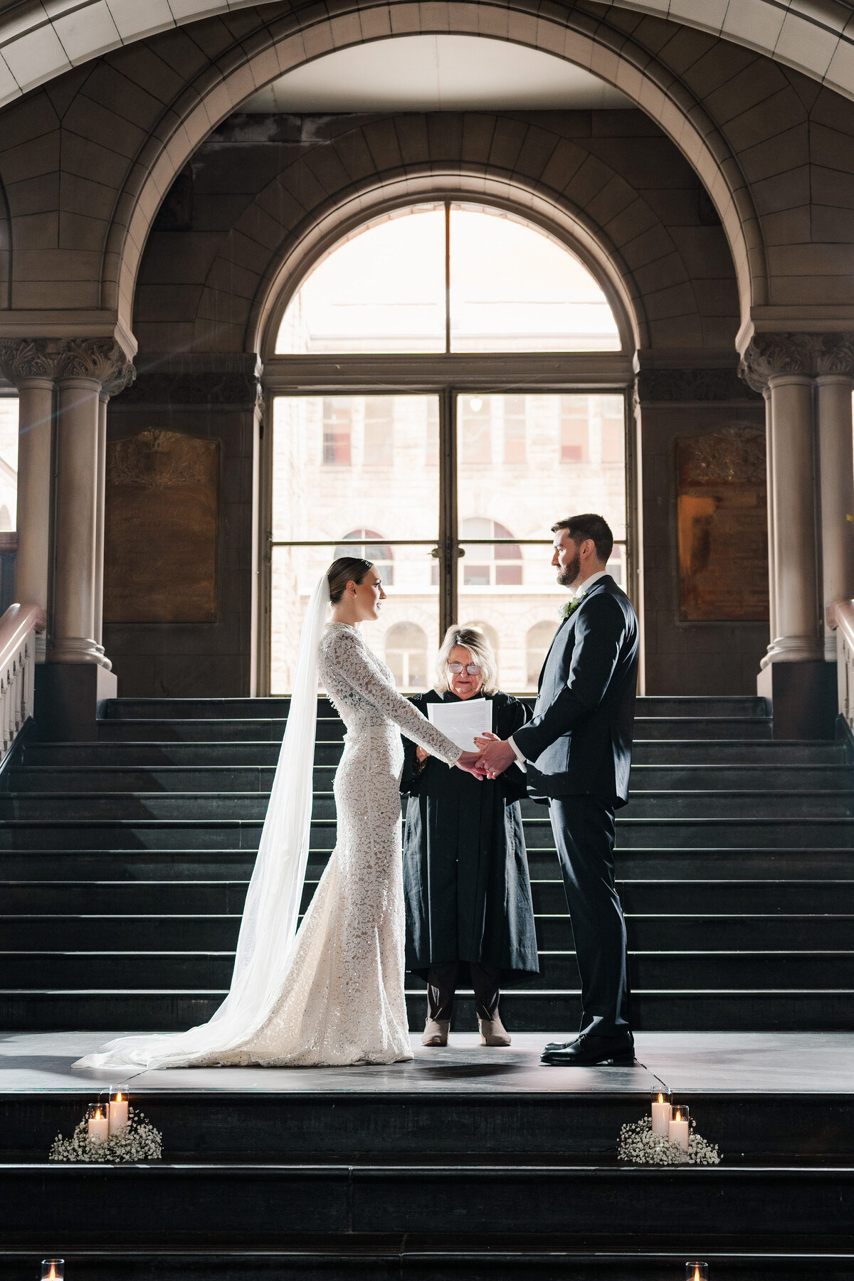 wedding ceremony on the staircase of the allegheny county courthouse in downtown pittsburgh