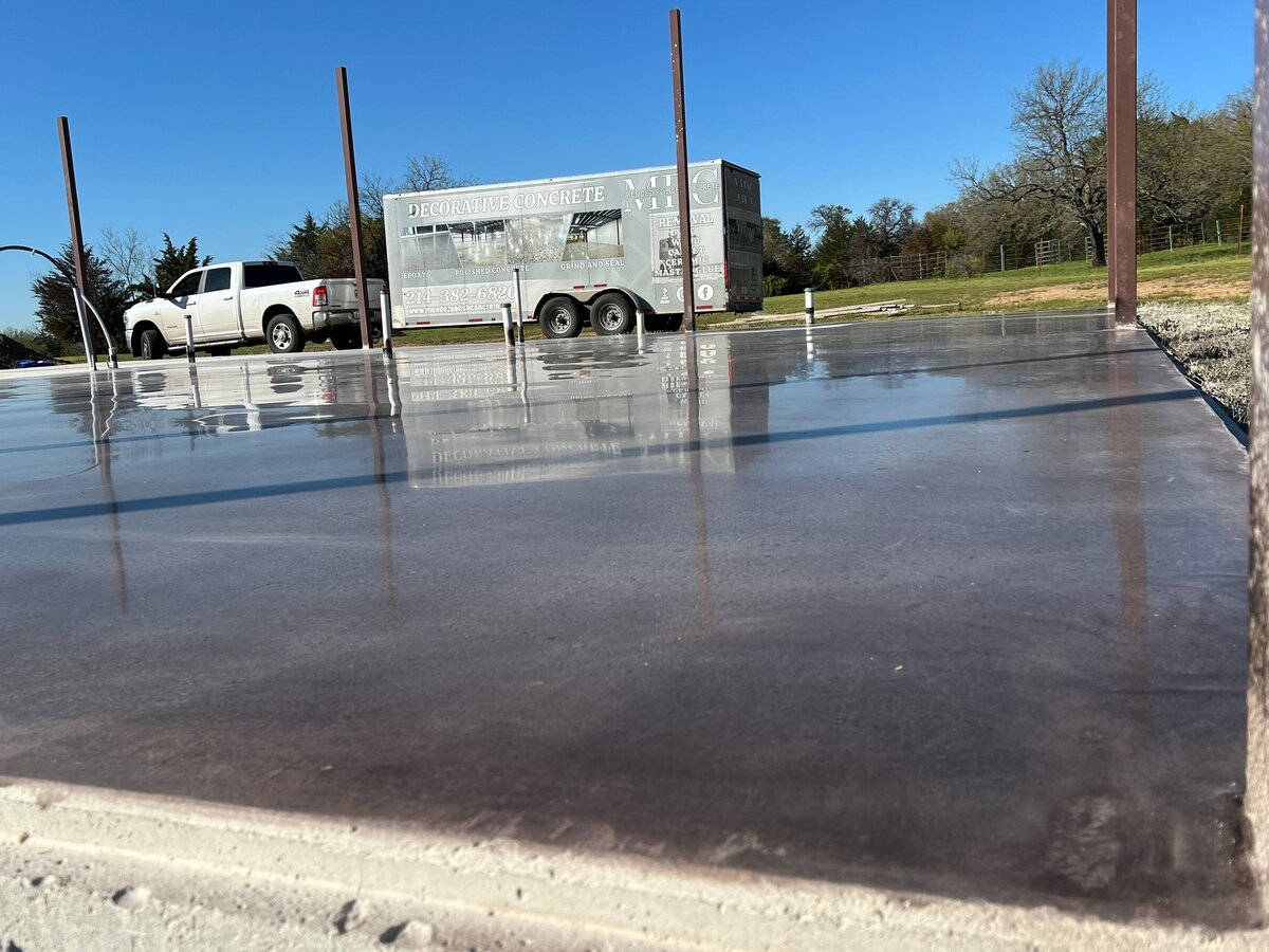 Top Residential Concrete Contractors DFW showing a skilled contractor working on a residential concrete project in the Dallas-Fort Worth area, emphasizing expertise and attention to detail in home construction and renovation.