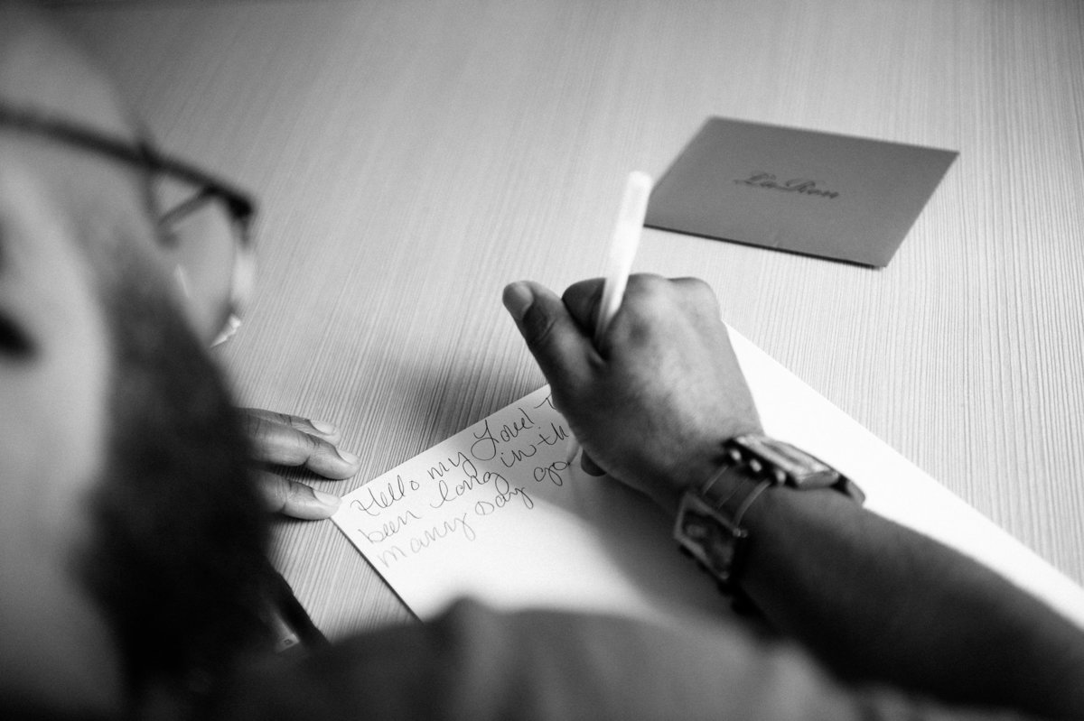 Groom writes a love letter to his beautiful bride on their wedding day.