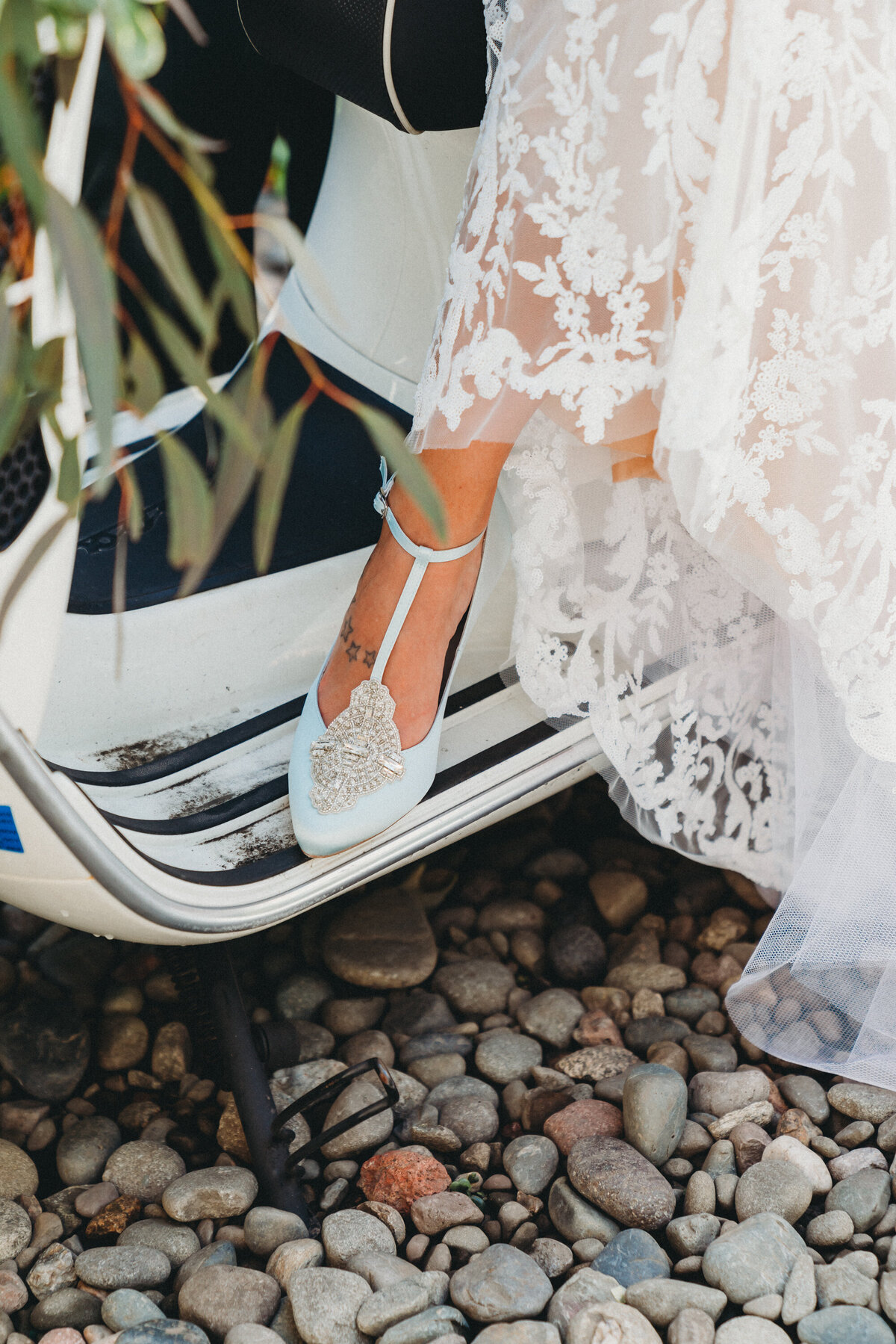 Photo of a bride's blue wedding shoes