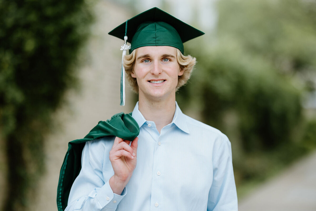 2024 Longview Lobo graduation picture of senior boy in cap and gown