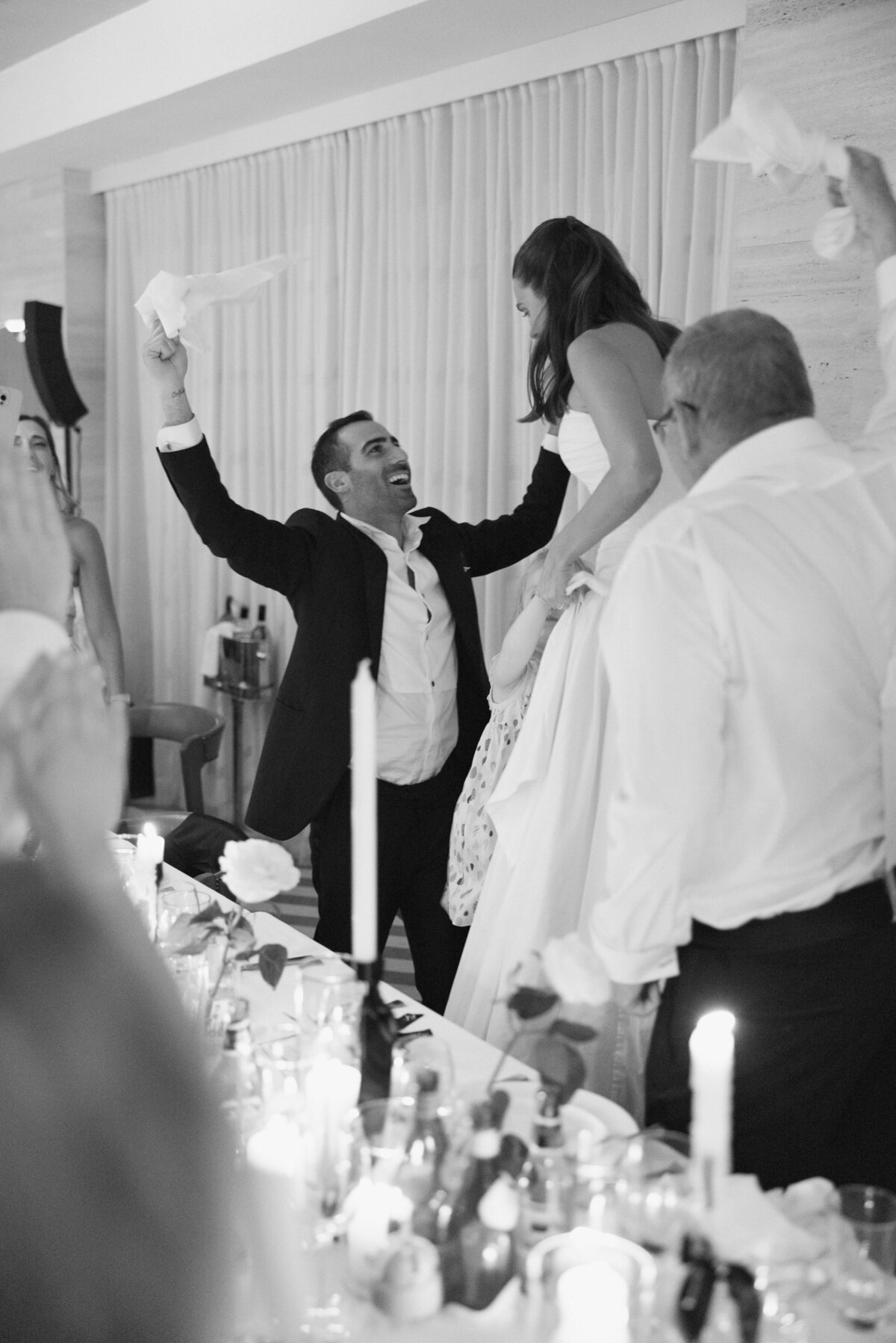 Groom giving emotional wedding toast during Rome reception

