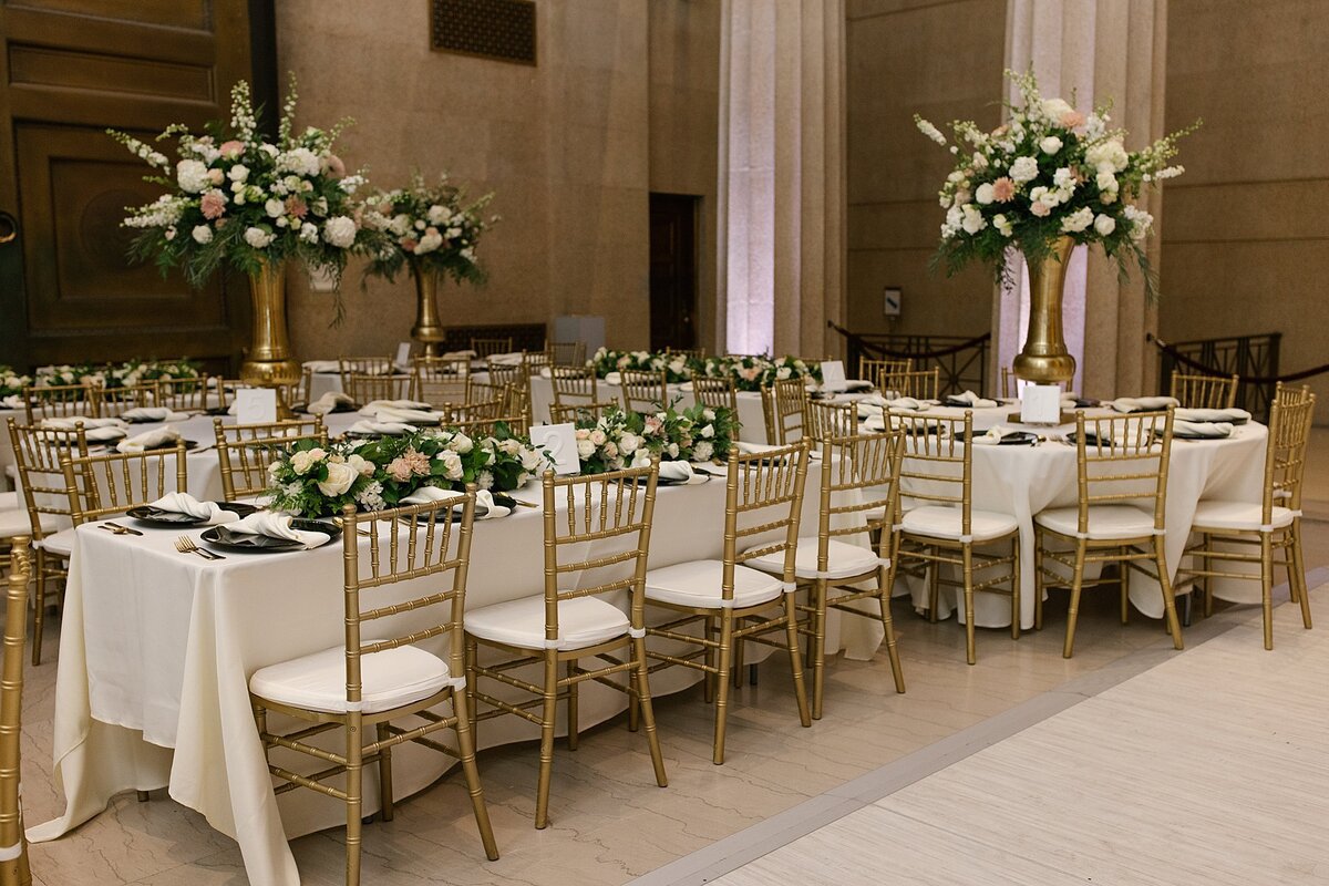 Elegant ivory and gold wedding at The Parthenon Nashville with elaborate floral decor