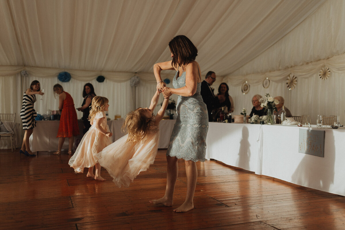 wedding guests dancing with children