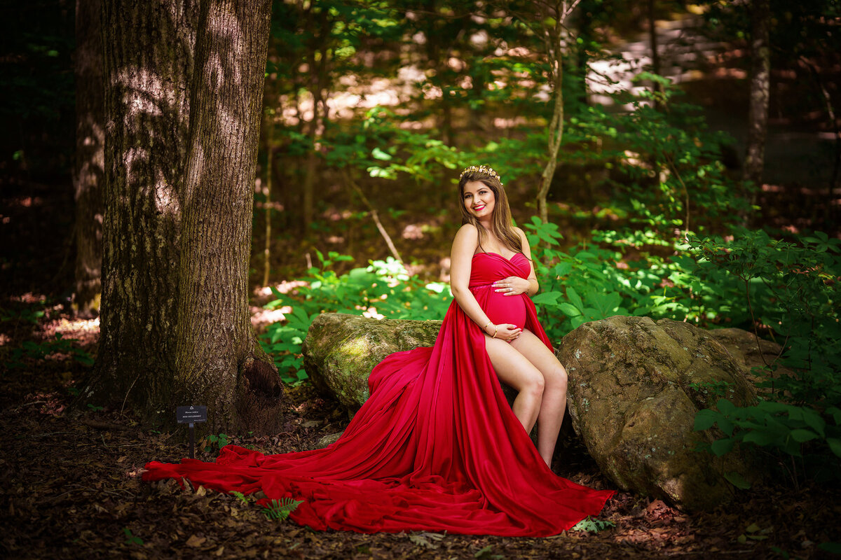 maternity woman mother red dress outdoors