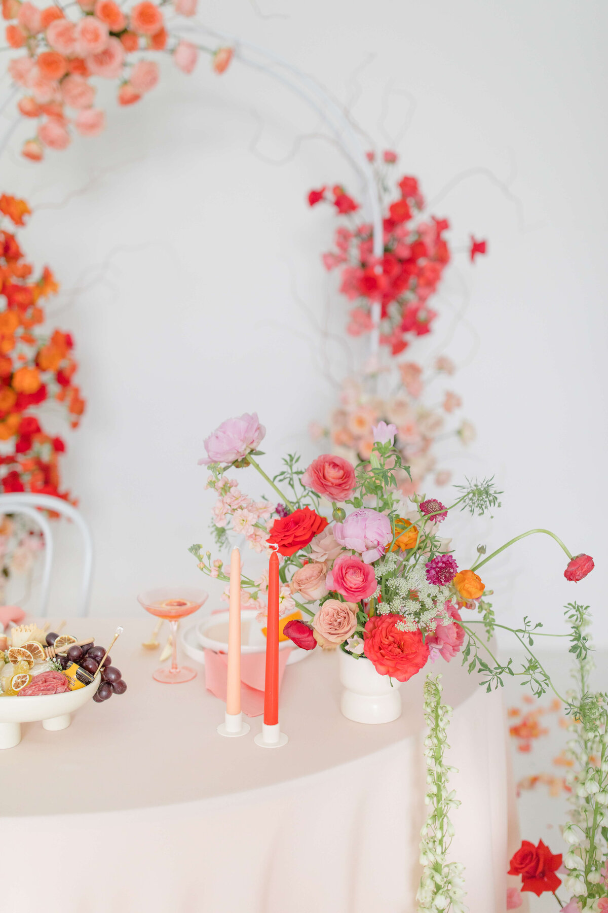 floral displays of bright red, orange and pink