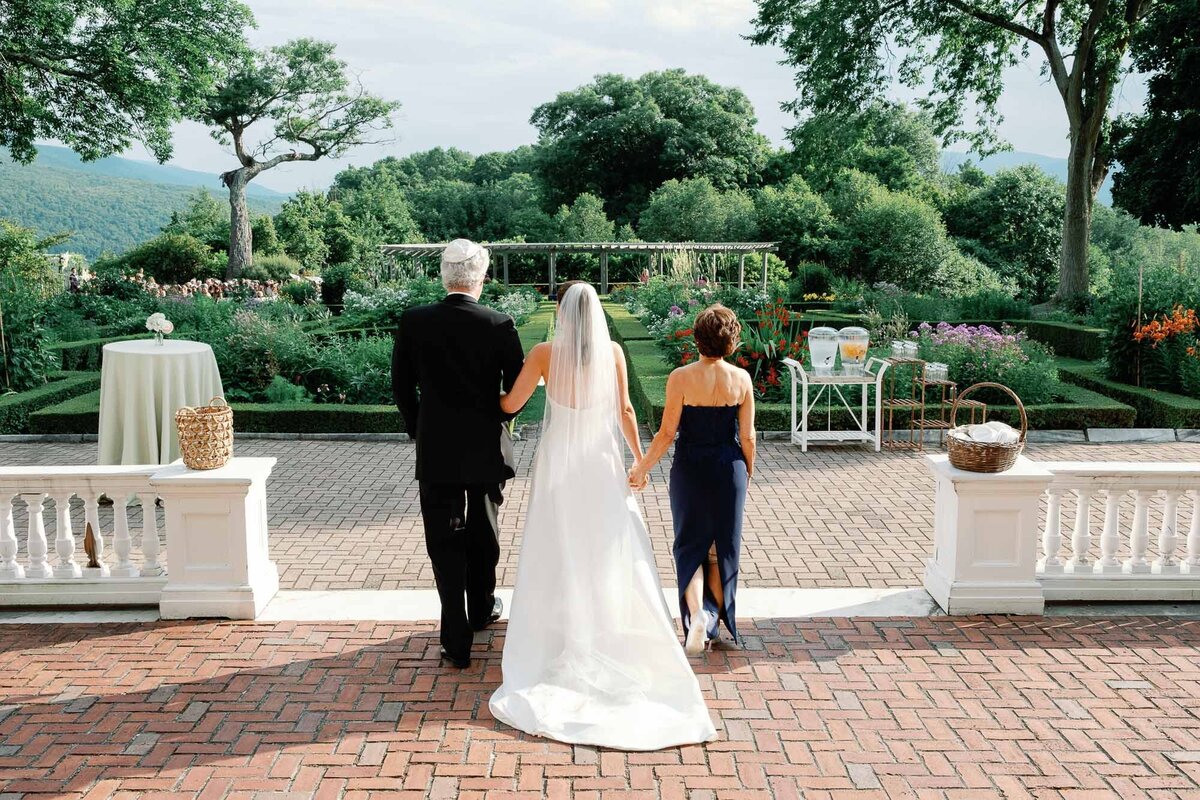 groom looks at bride at hildene wedding in manchster, vt ceremony