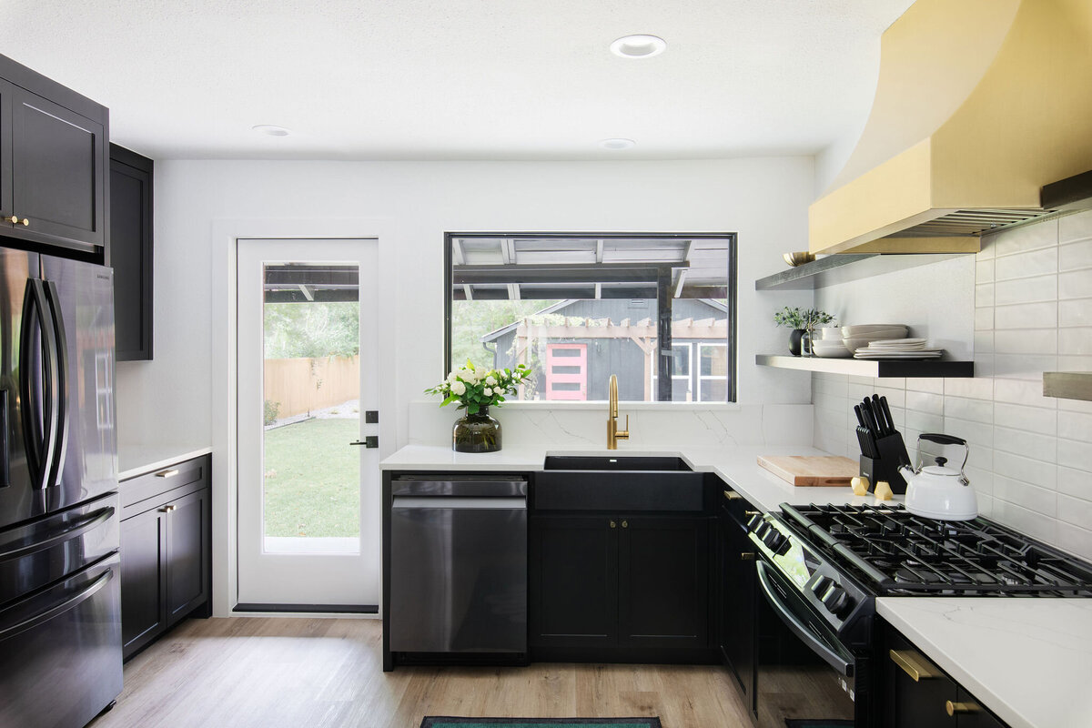 modern chic posh kitchen black and brass remodel rental design 16