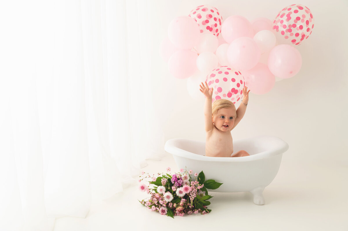 melkbadje met bloemen voor eerste verjaardag