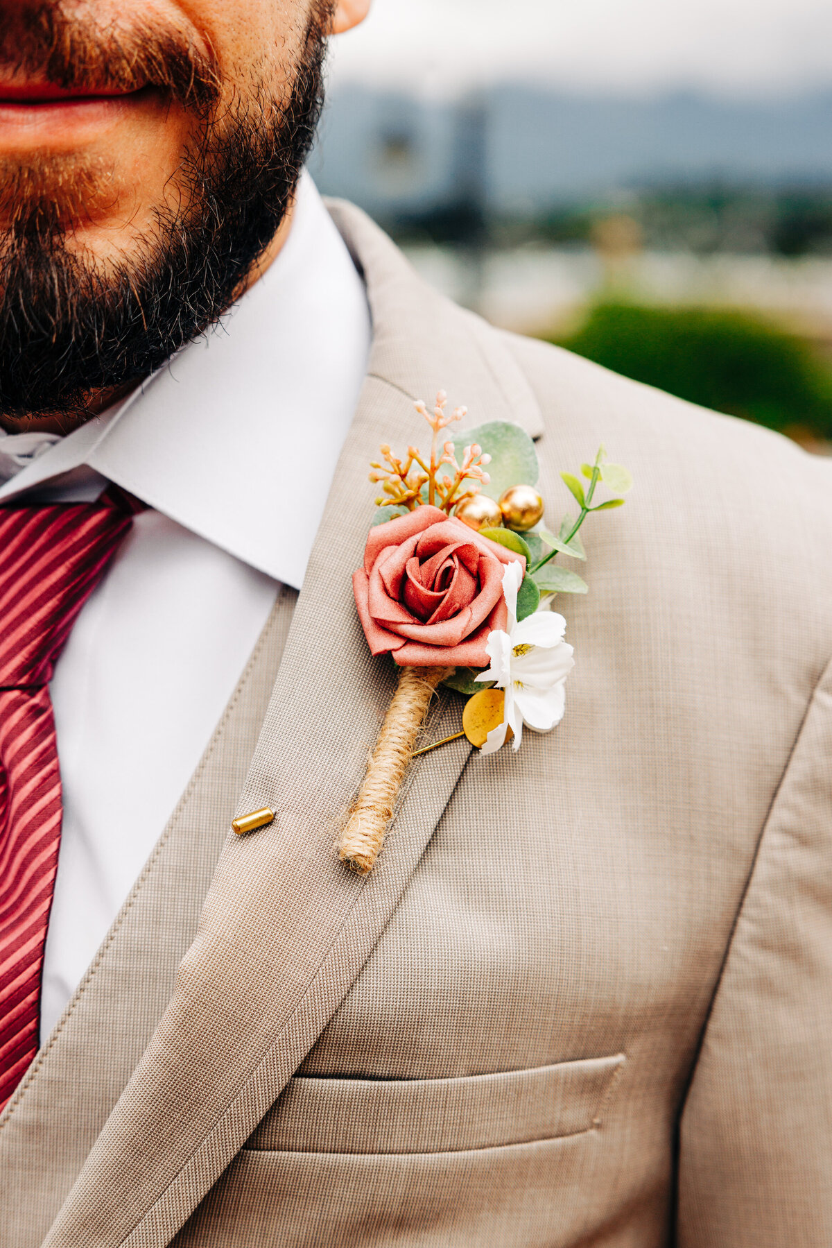Detail photo of groom boutonniere