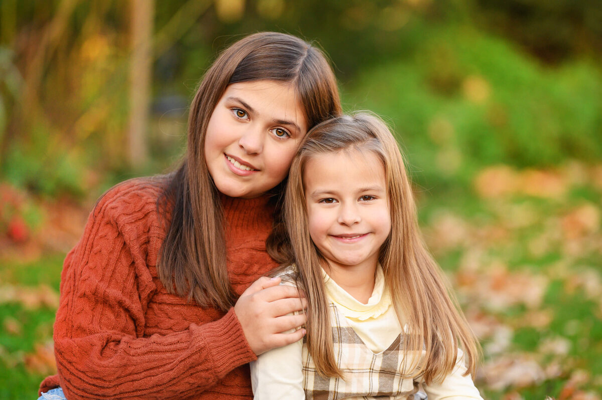 Two sisters up-close for their fall family photos in Burlington, On