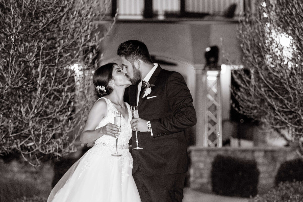 bride and groom kissing