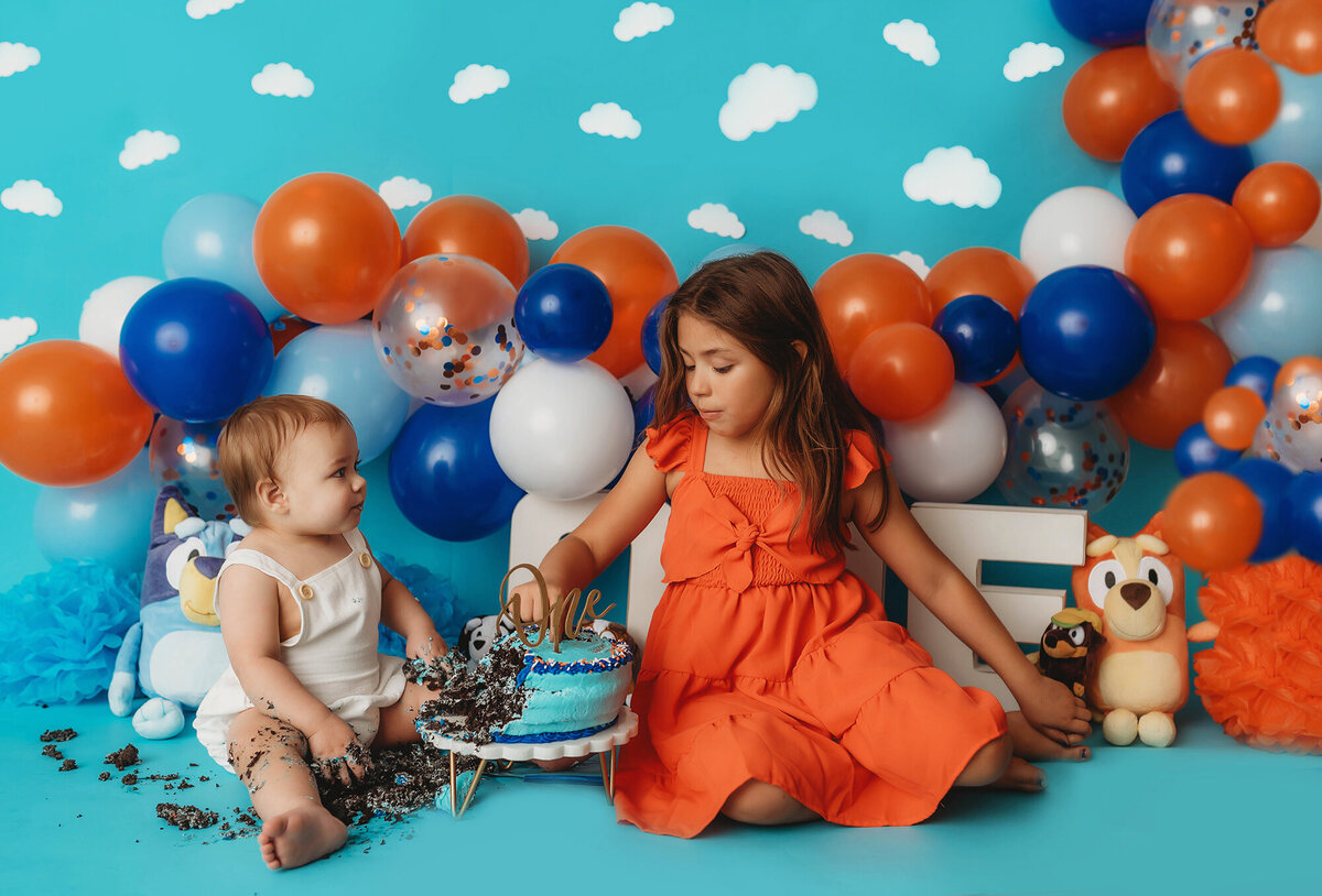 Baby celebrates first birthday with a Cake Smash Portrait Session in Asheville, NC.