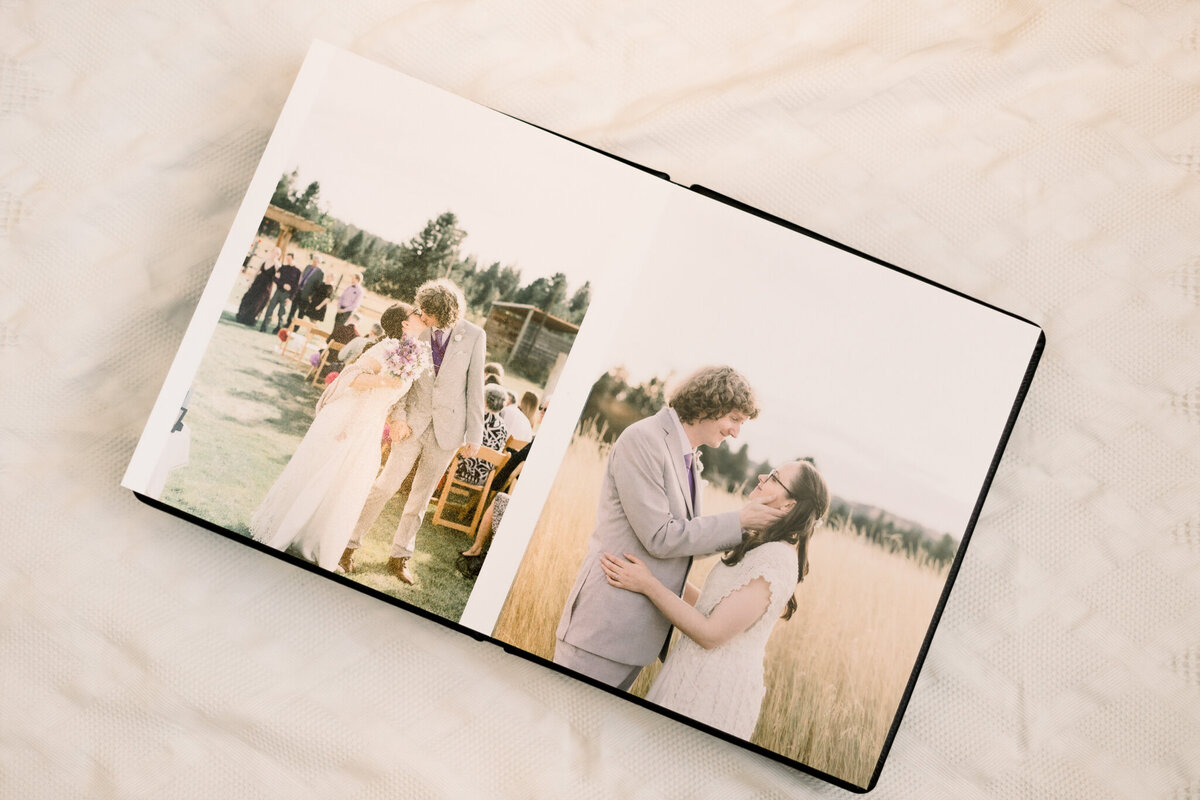 leather photo album open for display taken by Spokane engagement  photographer