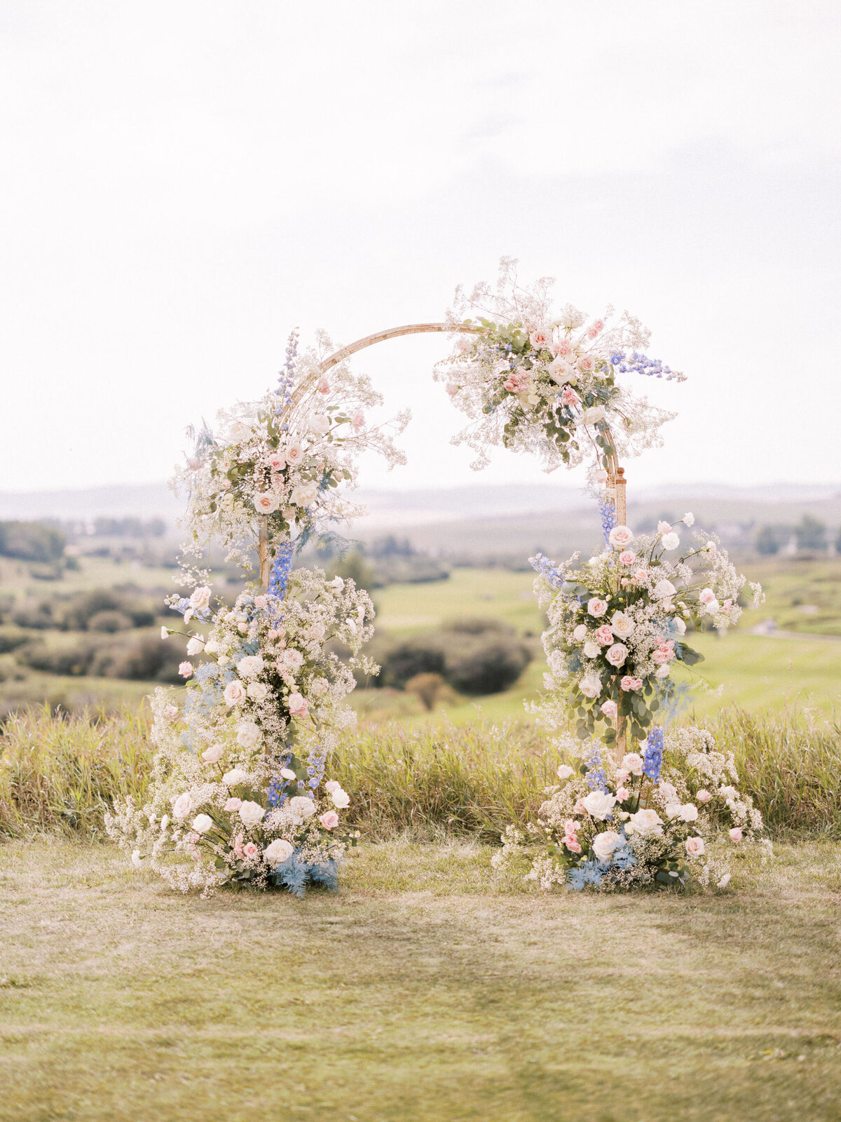 ethereal-romantic-floral-arch-blue-airy-babys-breathe-melissa-dawn-event-designs