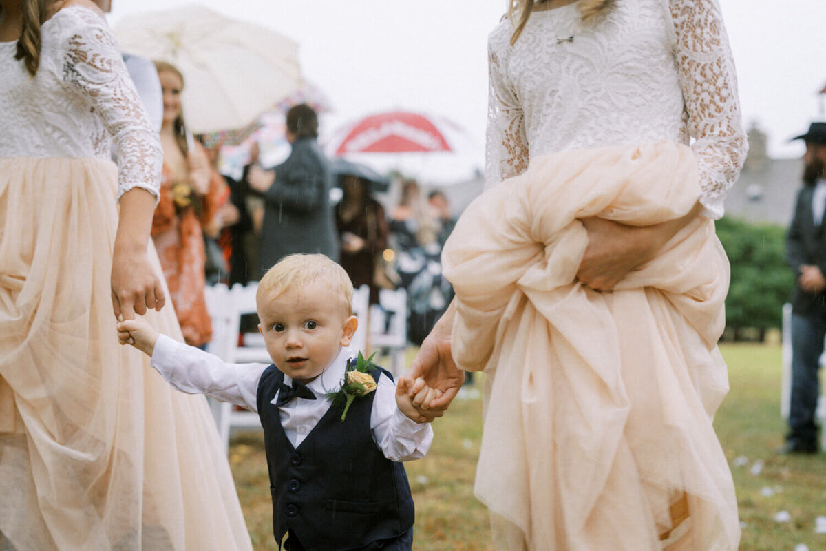 little-kids-holding-hand-in-rain