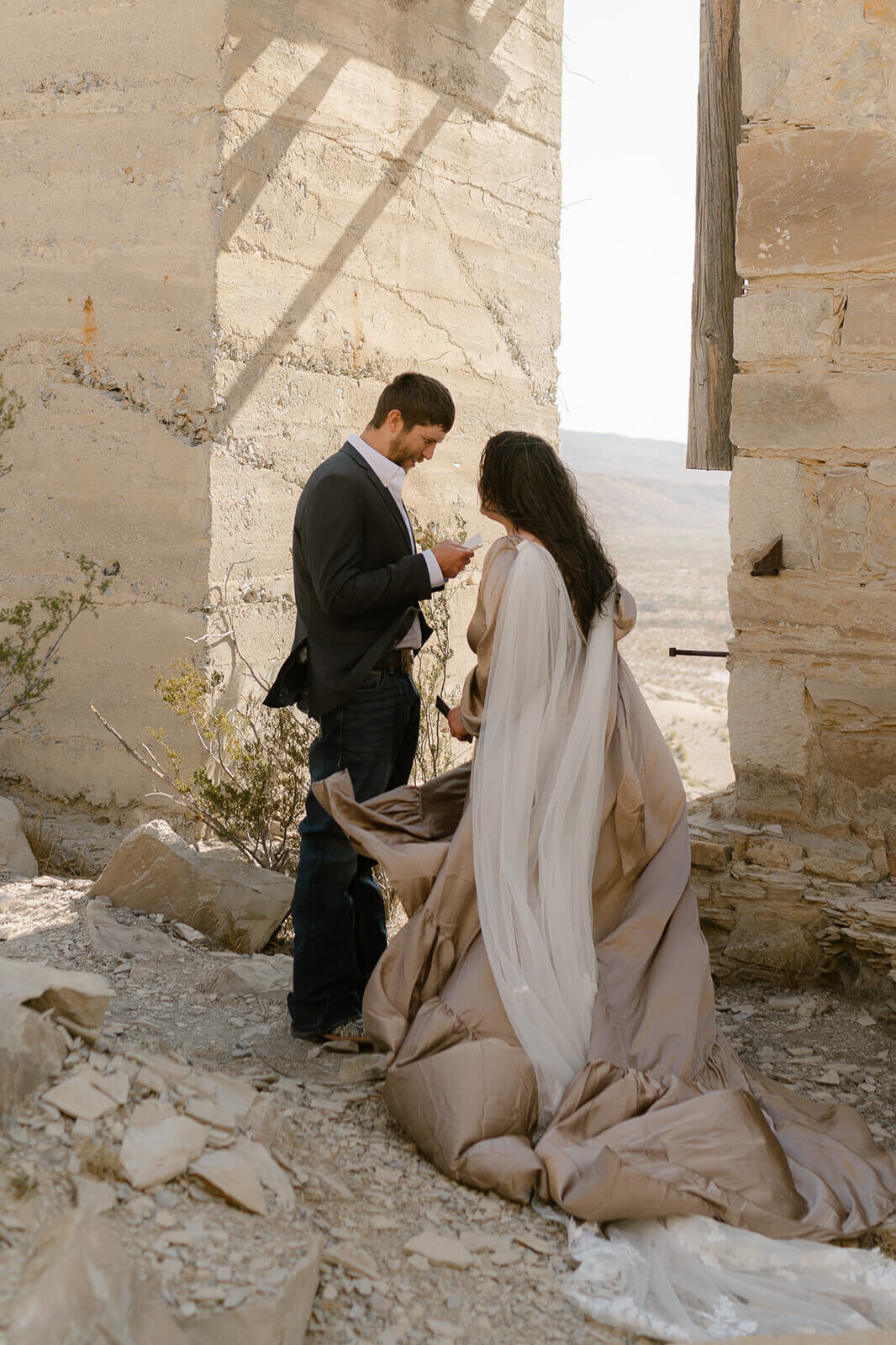 bride and groom laughing while saying vows