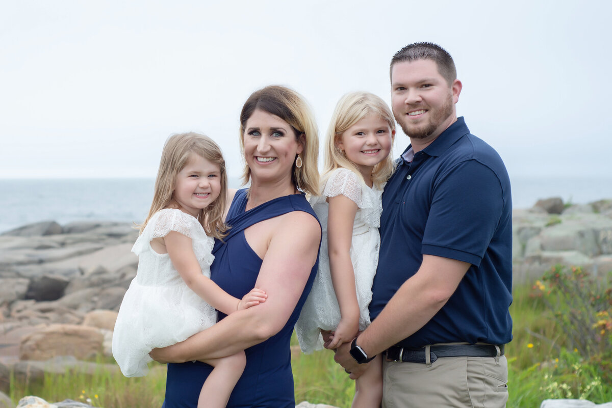 Family portrait at Nubble Light in York Maine