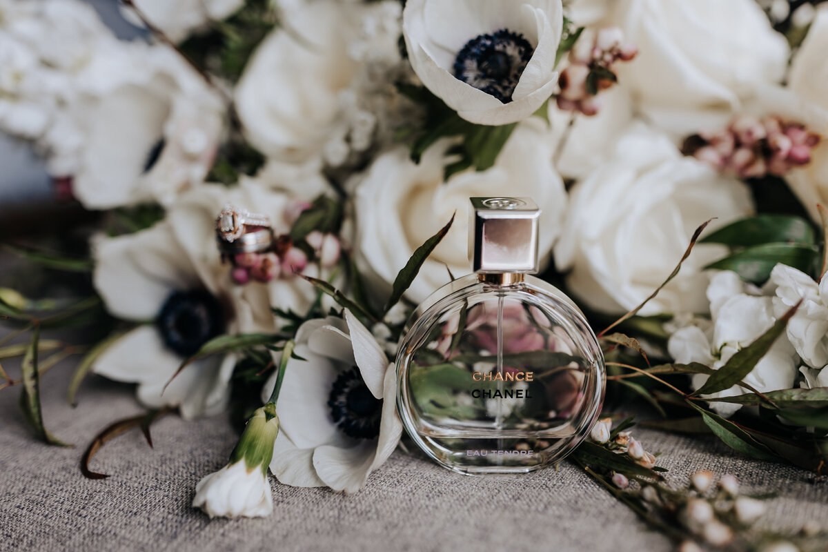 Nashville wedding photographer captures bridal bouquet with perfume bottle