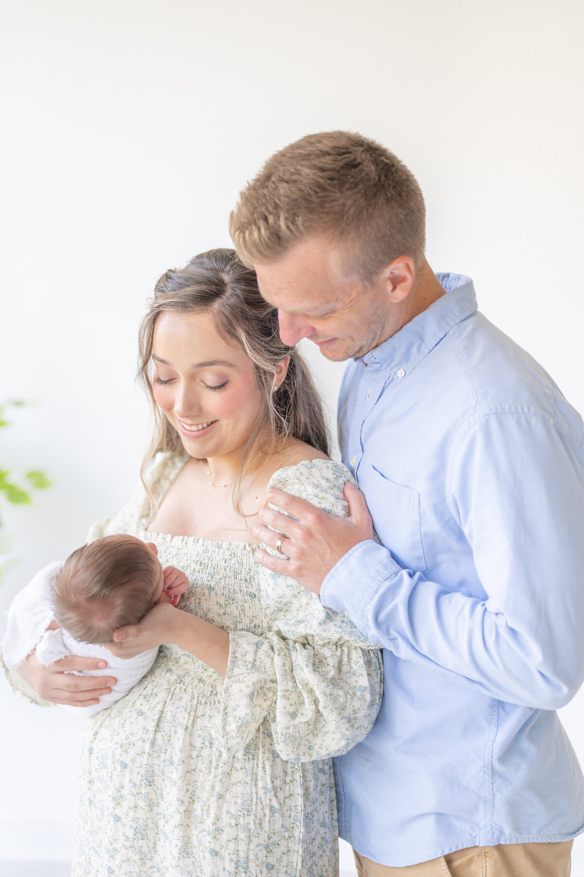 parents and baby by Raleigh Newborn Photographer