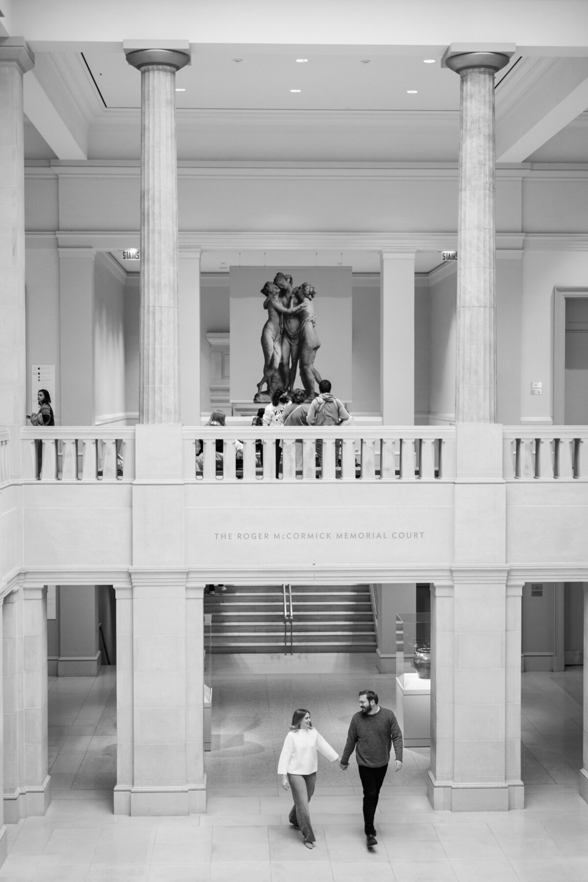 An indoor engagement session at the Art Institute of Chicago