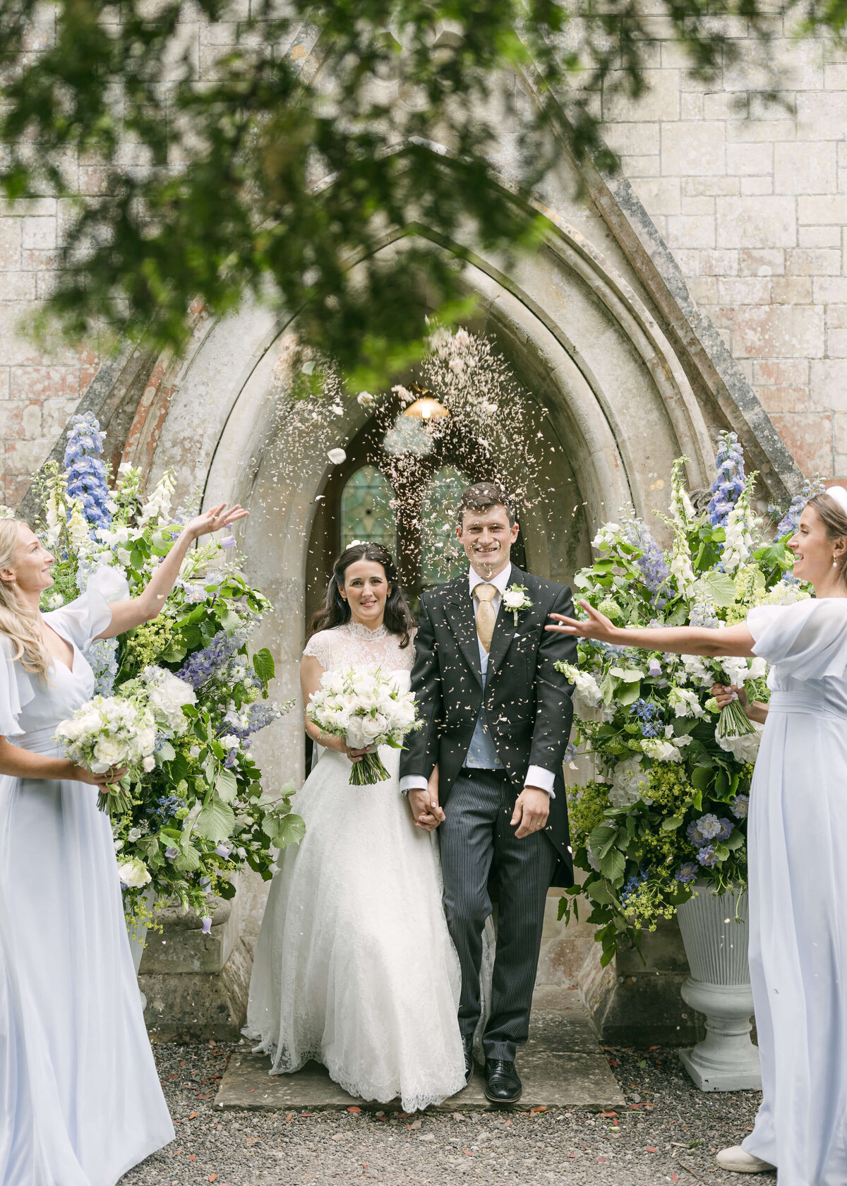 chloe-winstanley-weddings-wiltshire-church-confetti-exit