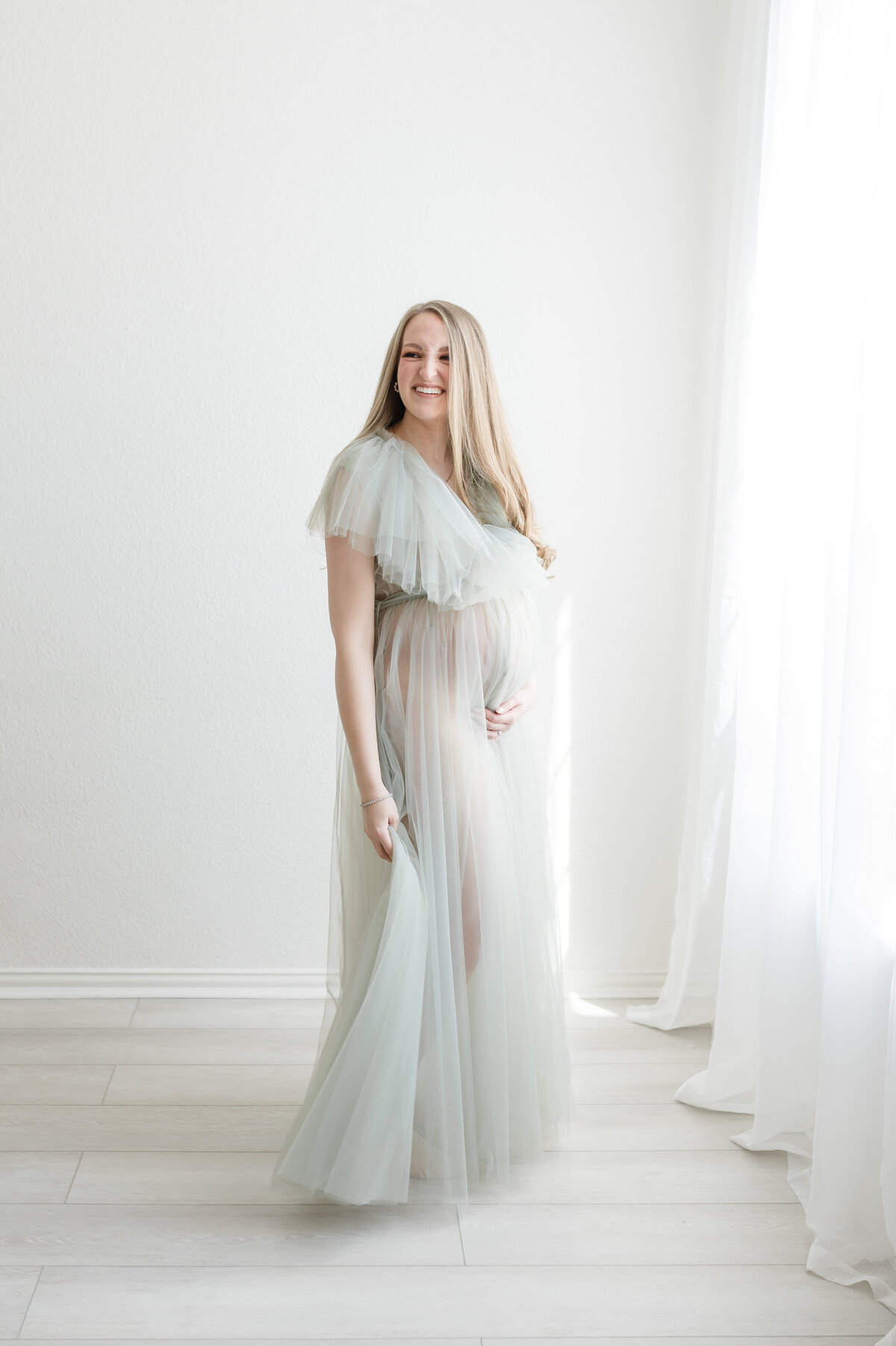 mom standing in elegant down