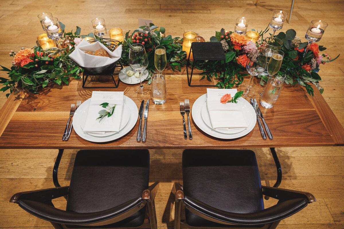 Couples table designed with greenery and flowers