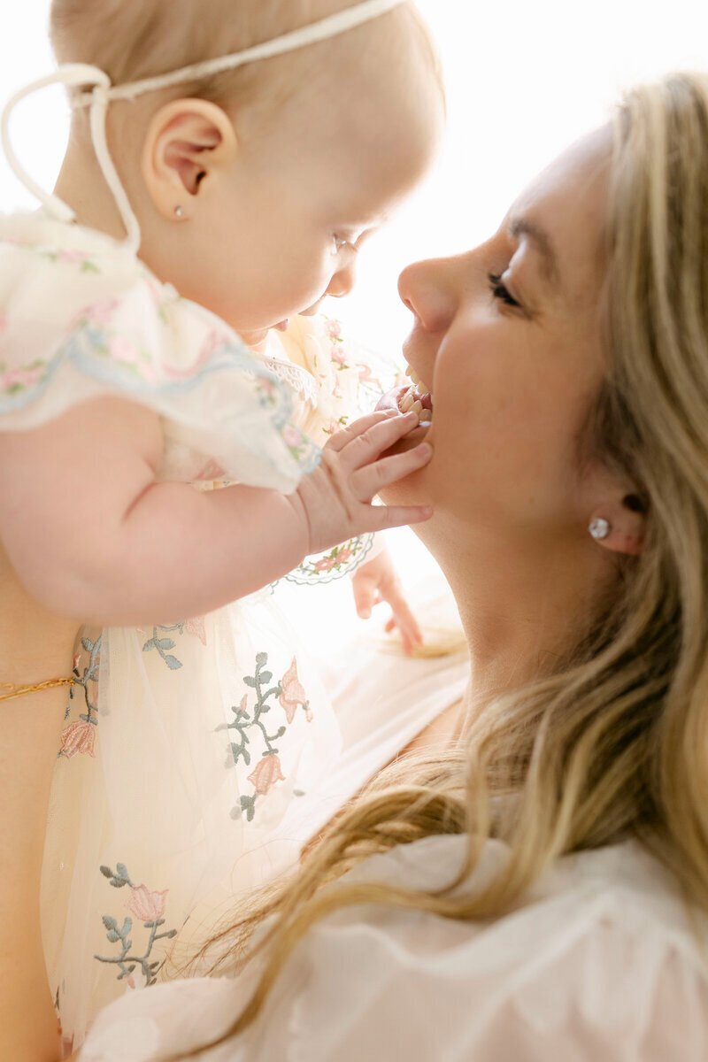 Mom and baby interacting and smiling, by nj photographers Ally Kimpton Photography