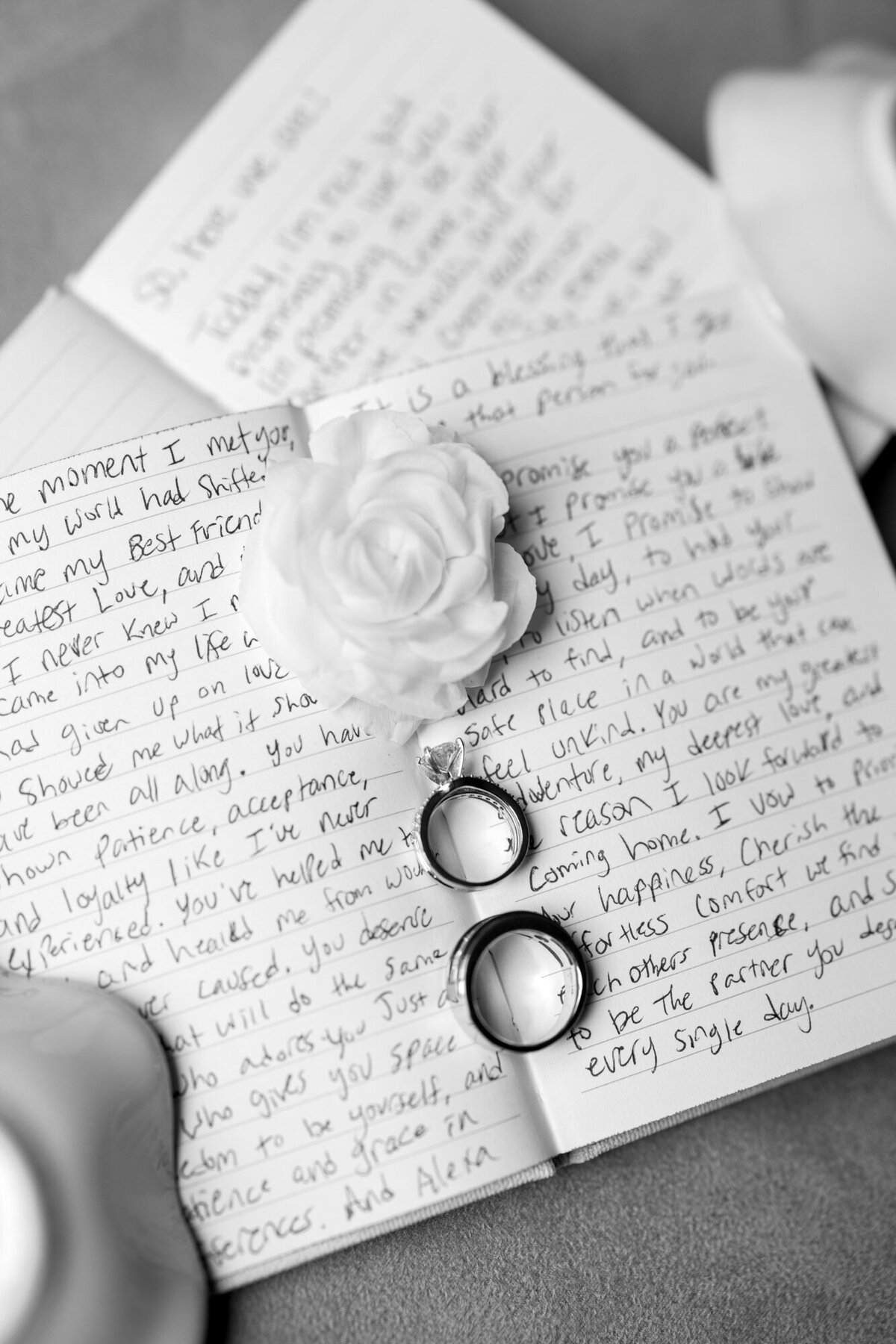 Vow book with wedding rings