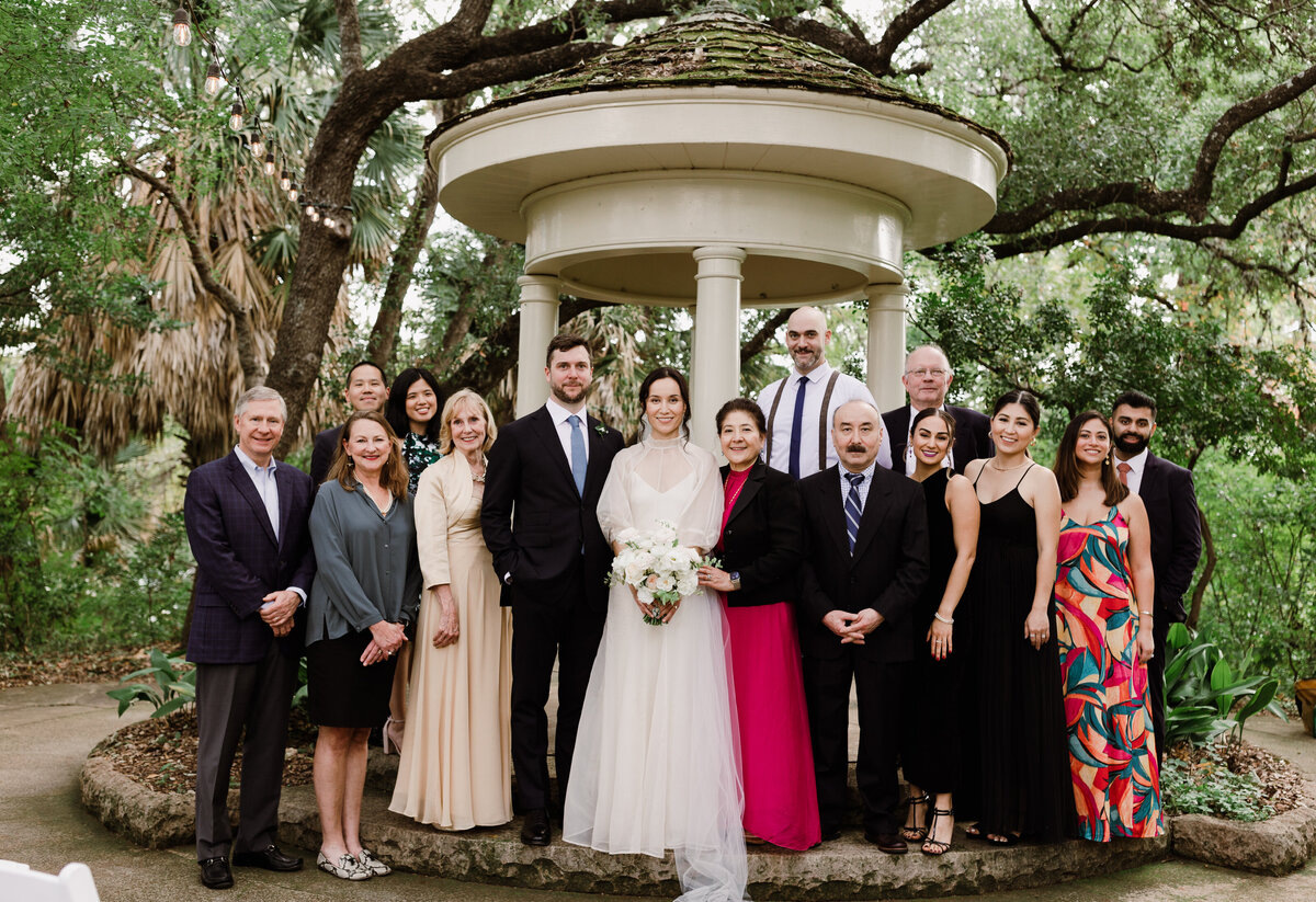 Bride and groom with wedding guests at Laguna Gloria wedding in Austin