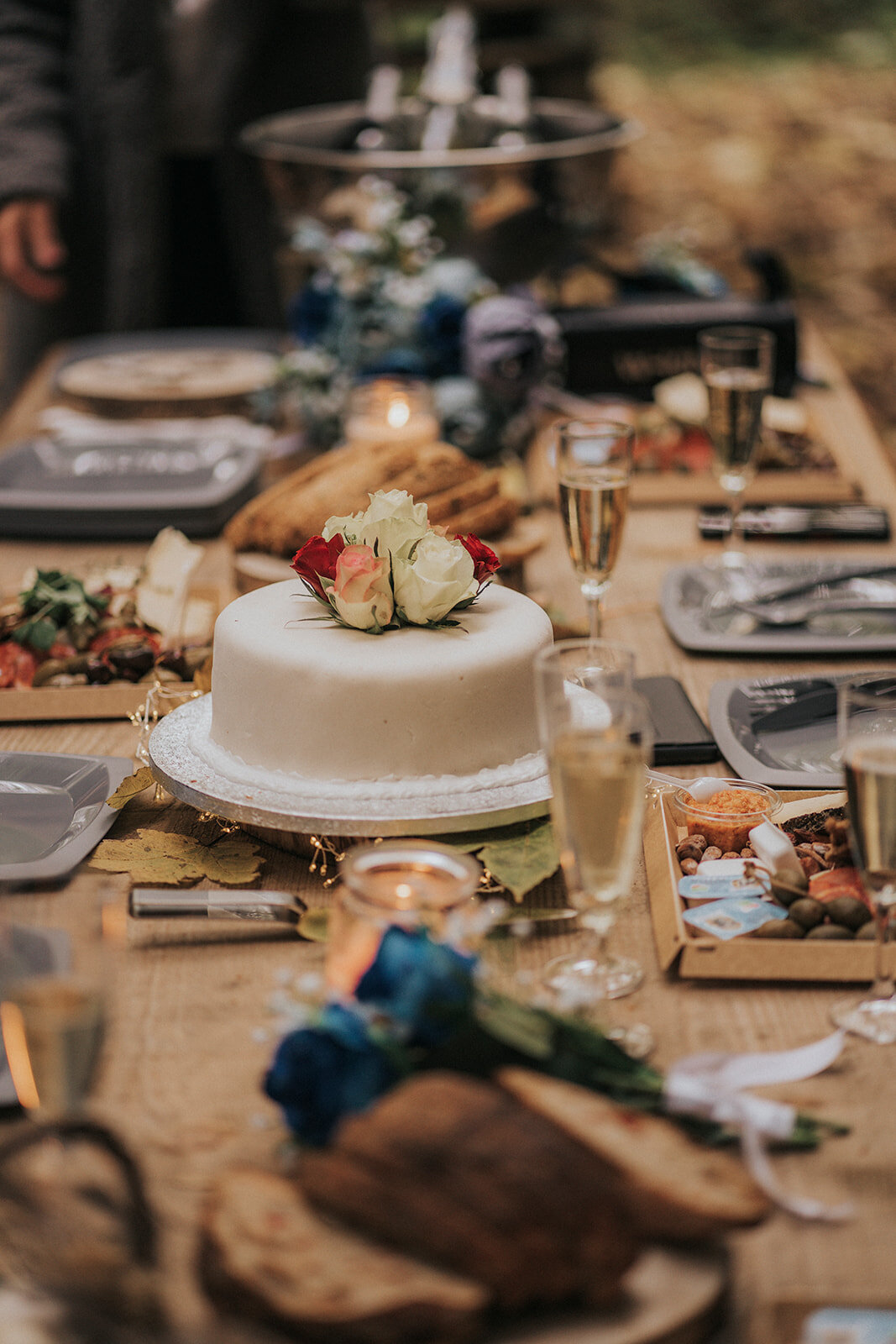 A rustic table set up with decorations, which couples can choose to add in their package while getting married abroad with a small family wedding celebration.