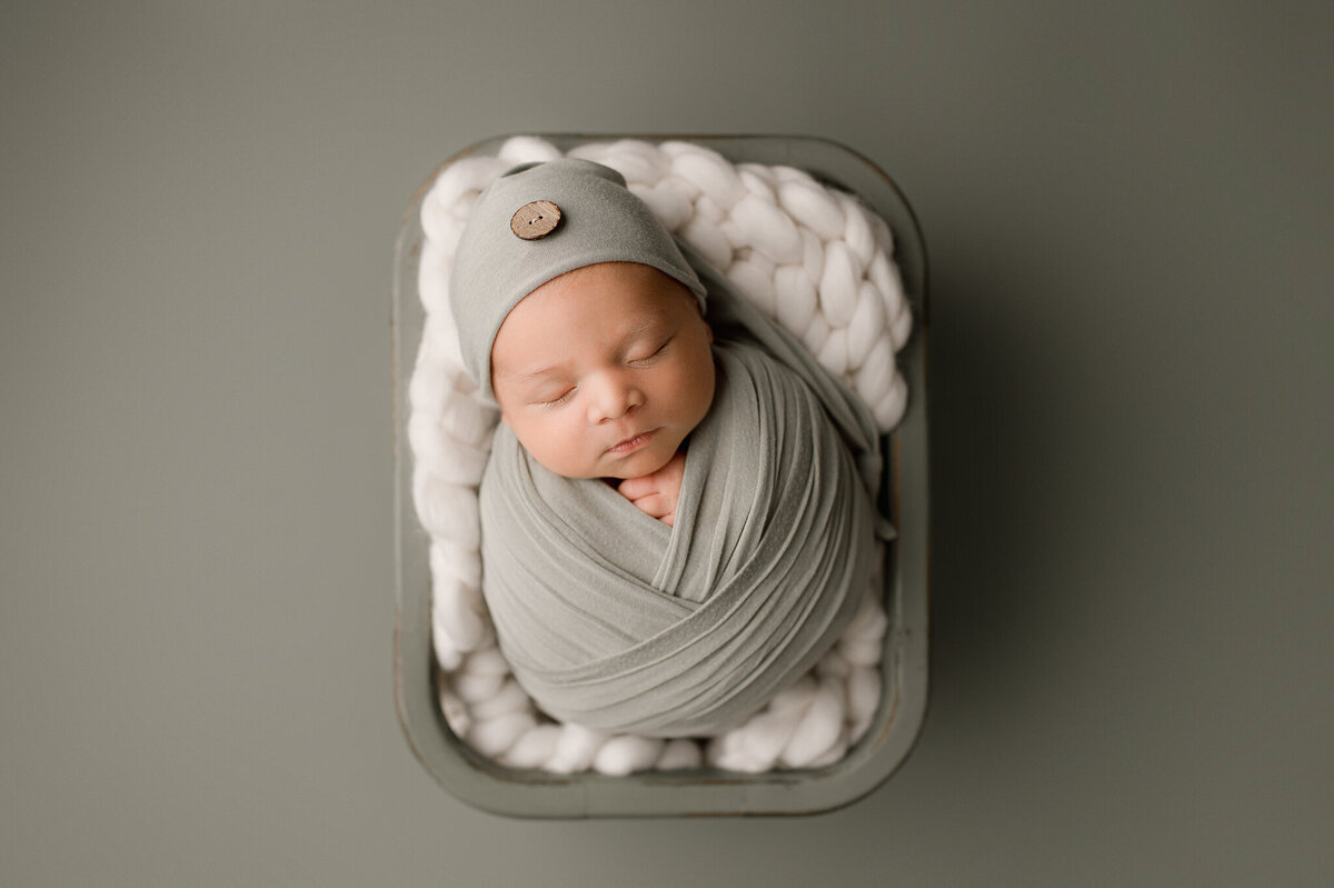 Swaddled newborn studio