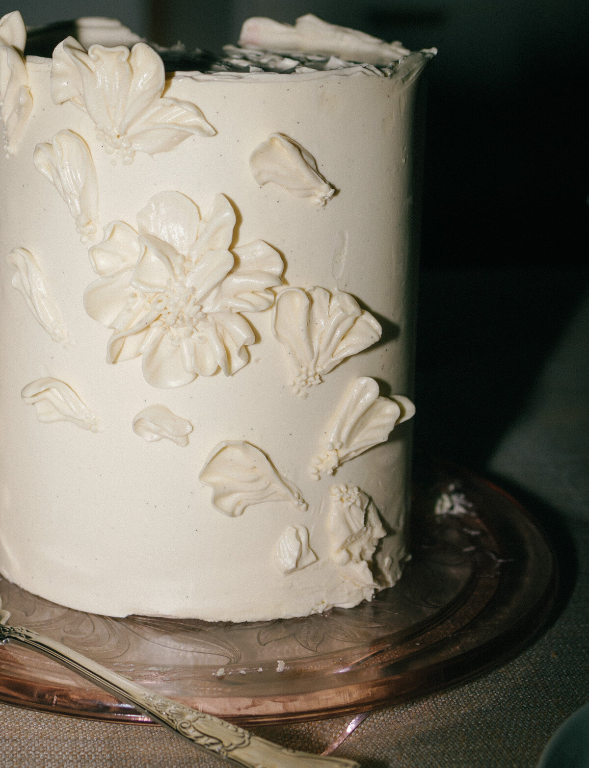 wedding cake detail with flowers, vanilla bean, simple