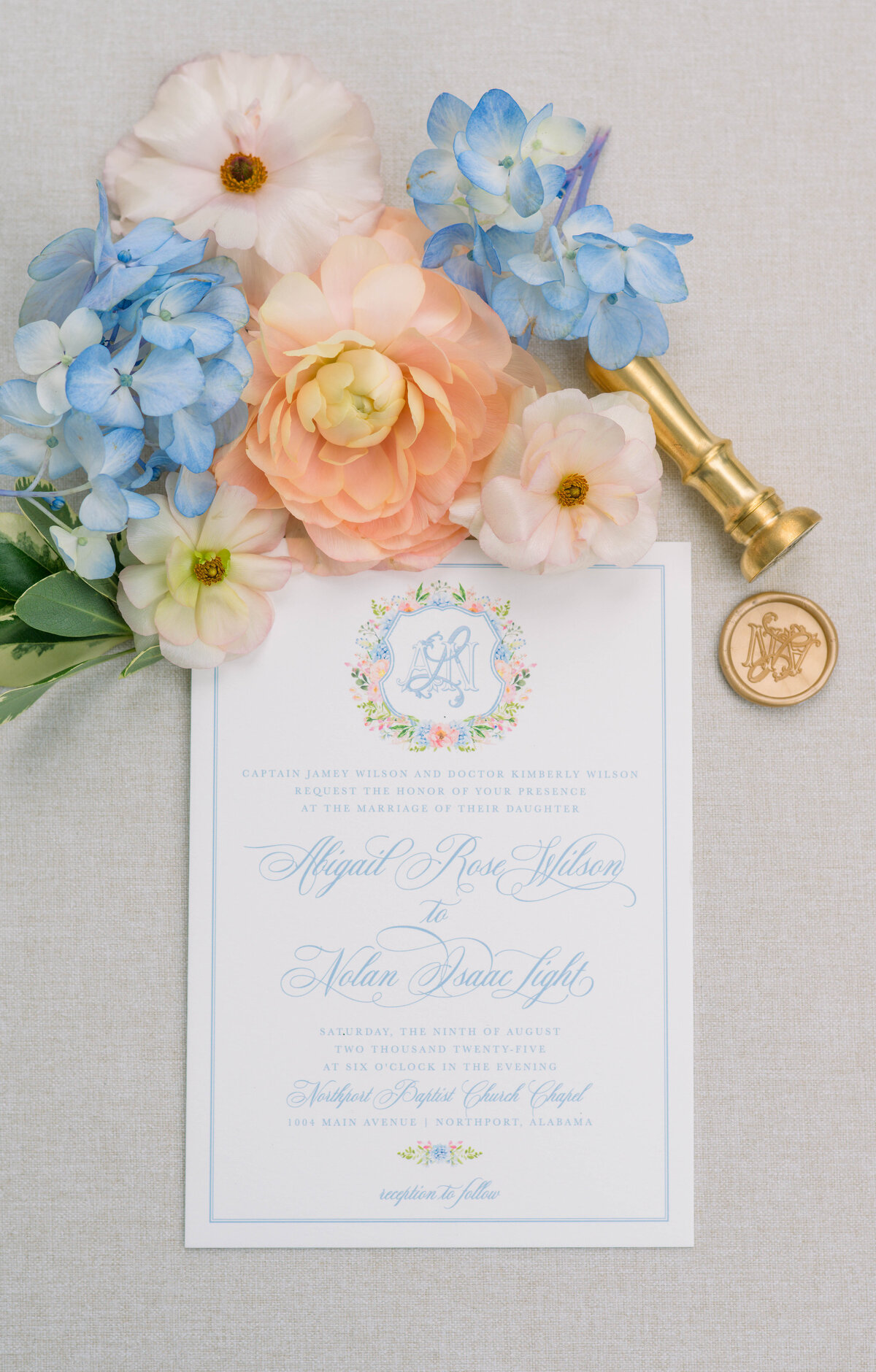 Wedding invitation suite by Ledgewood Fine Stationery styled with colorful summer florals at University Club in Tuscaloosa, Alabama
