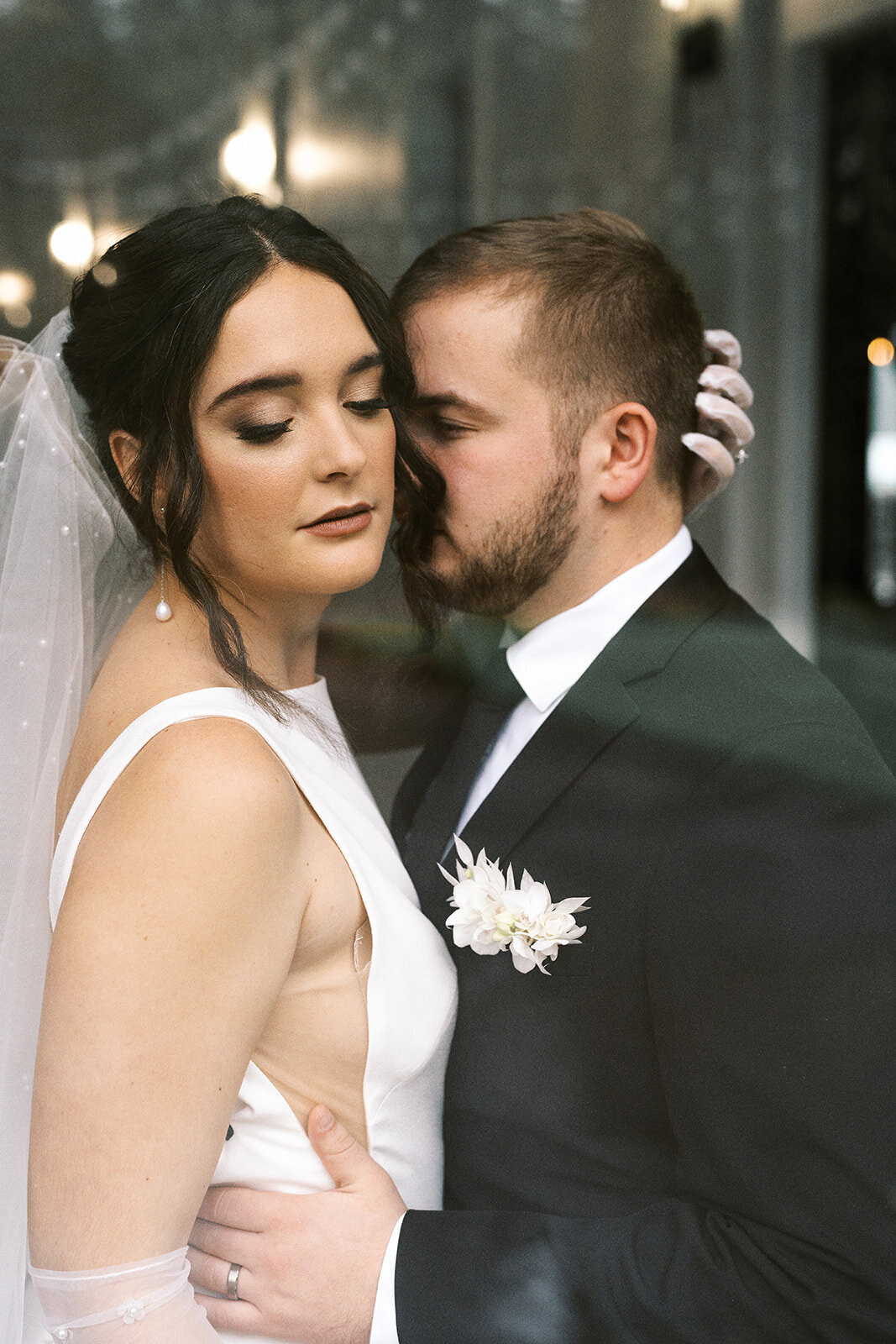 A bride and groom embracing at a styled photography shoot held at Sage and Social in Oregon.