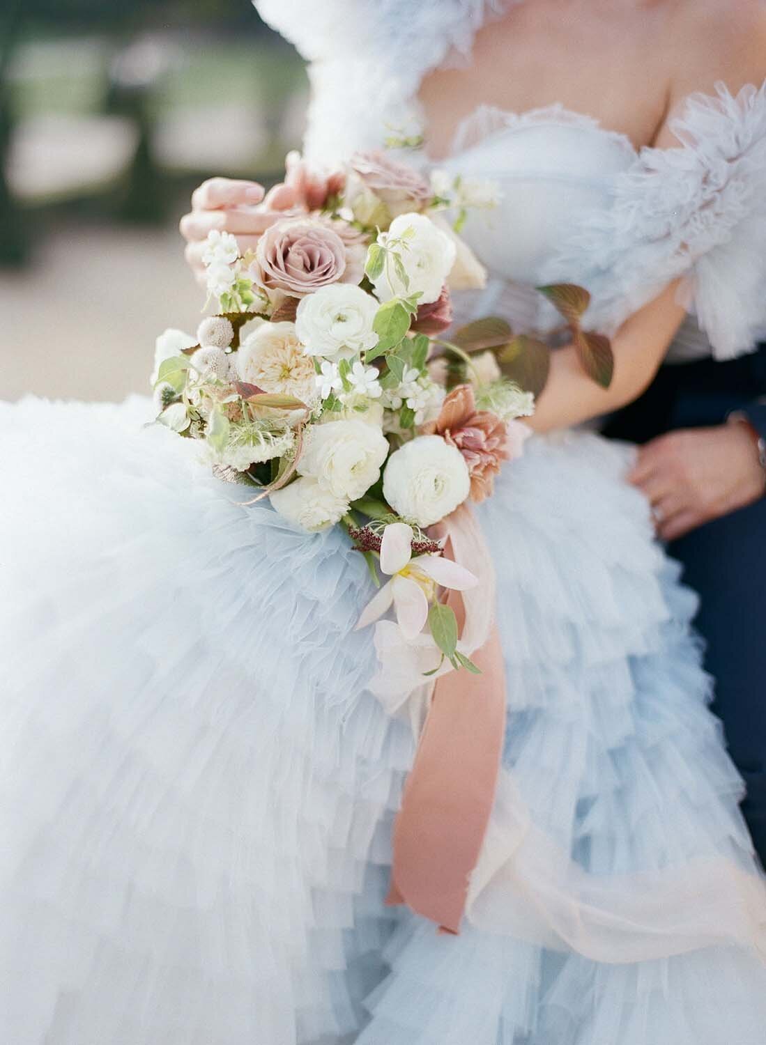 soft fall tones bridal bouquet and blue gown