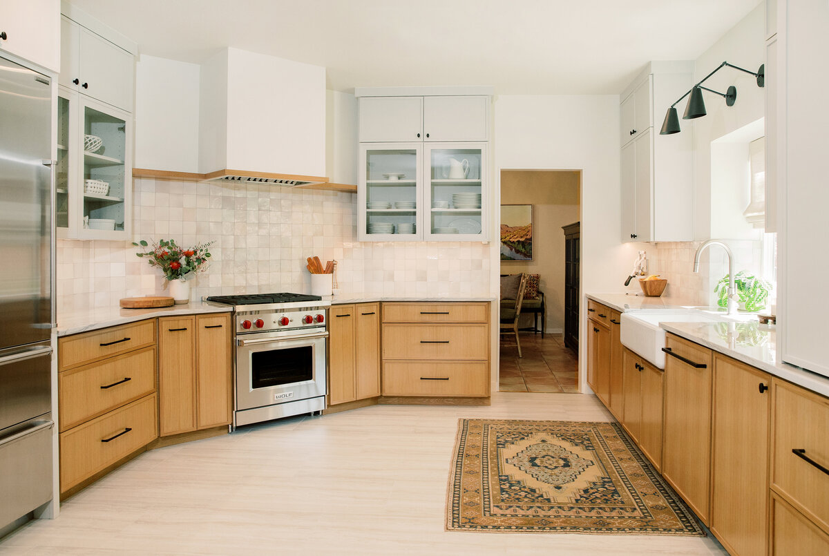 hello-home-modern-kitchen-remodel-natural-wood-cabinets-farmhouse-sink-zellige-backsplash-wolf-range-austin-11