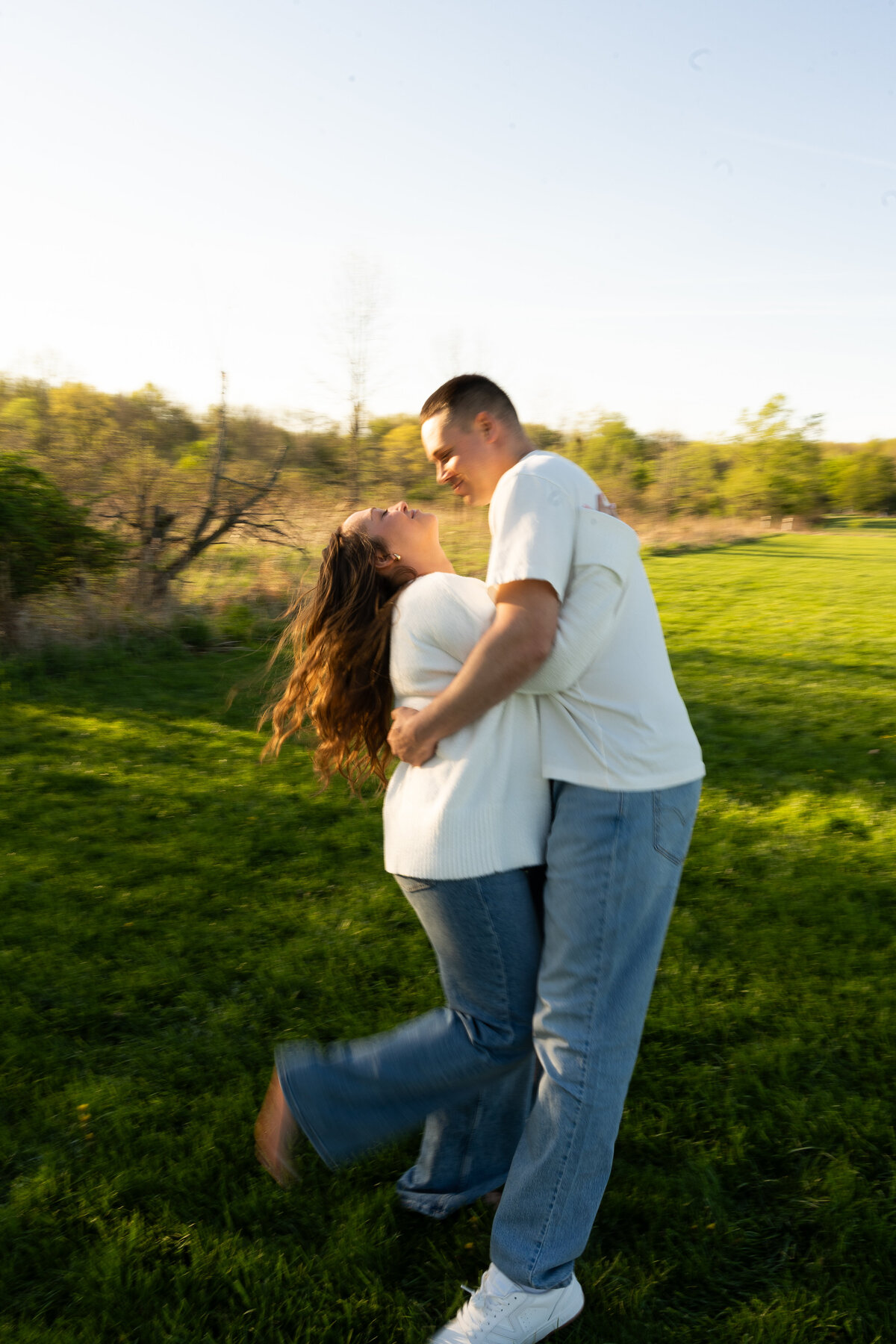 moody motion blur photo of couple embracing 