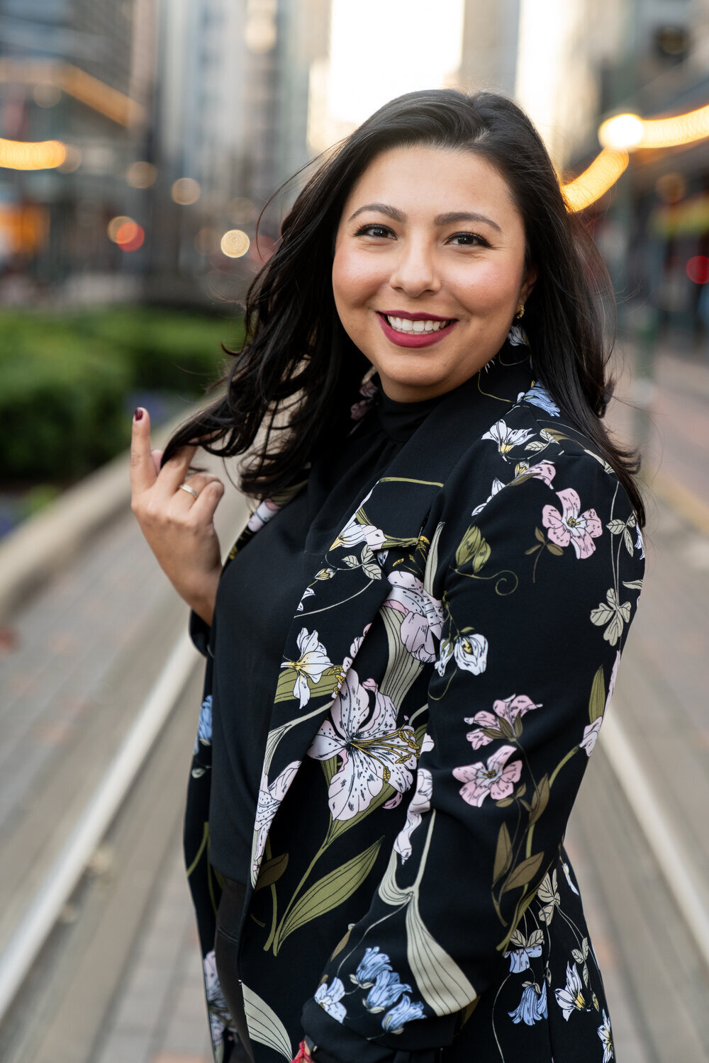 Realtor poses in Downtown Houston for branding photographs