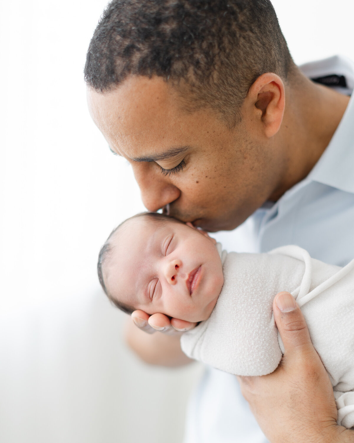 Newborn photography session with siblings at a Philadelphia photography studio - 21