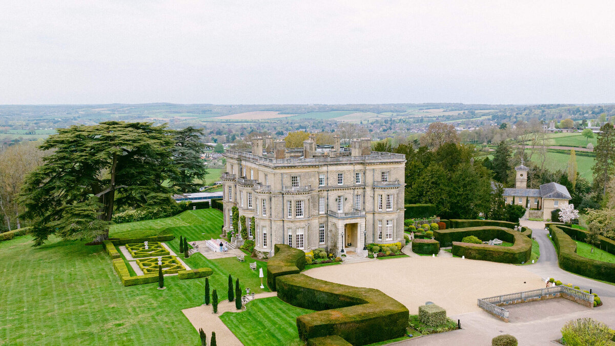 A wedding drone photo of the wedding venue Hedsor House in the UK