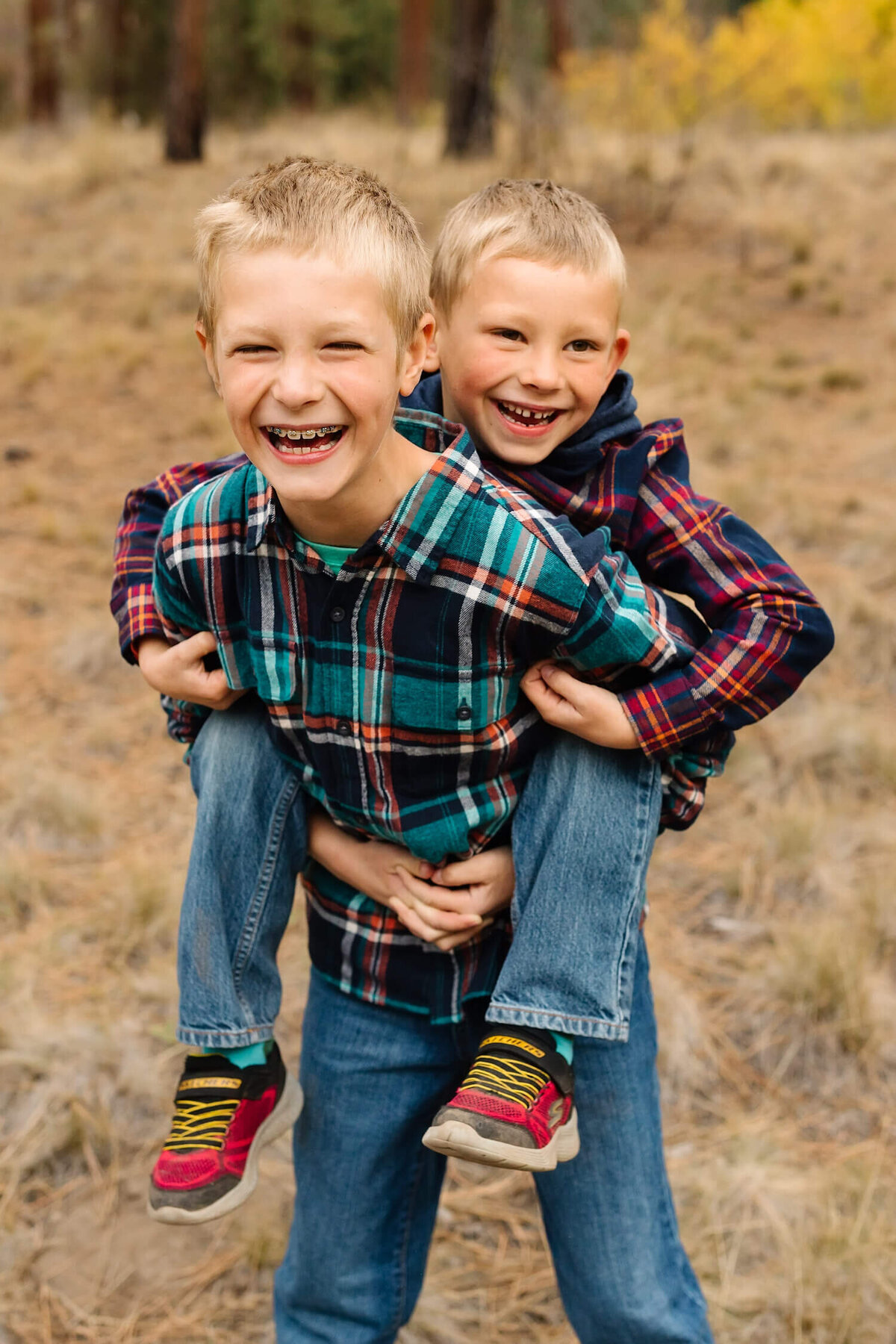 bend-family-photographer-brother-giving-piggyback-ride
