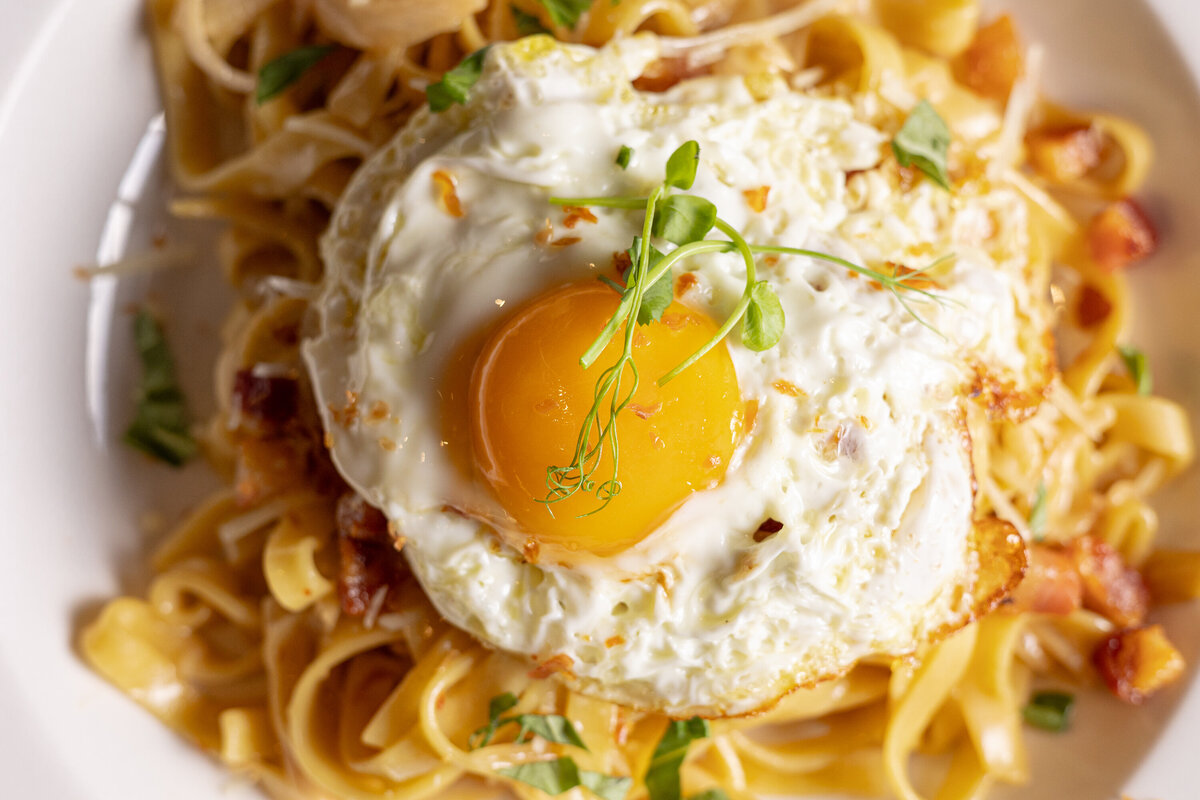 A close up photo of Carbonara.