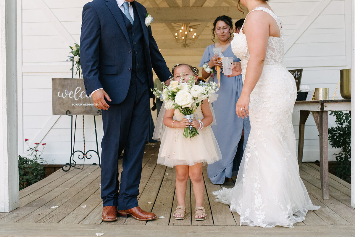 Emotional reaction from a guest during a heartfelt wedding speech, captured in an authentic, documentary style.